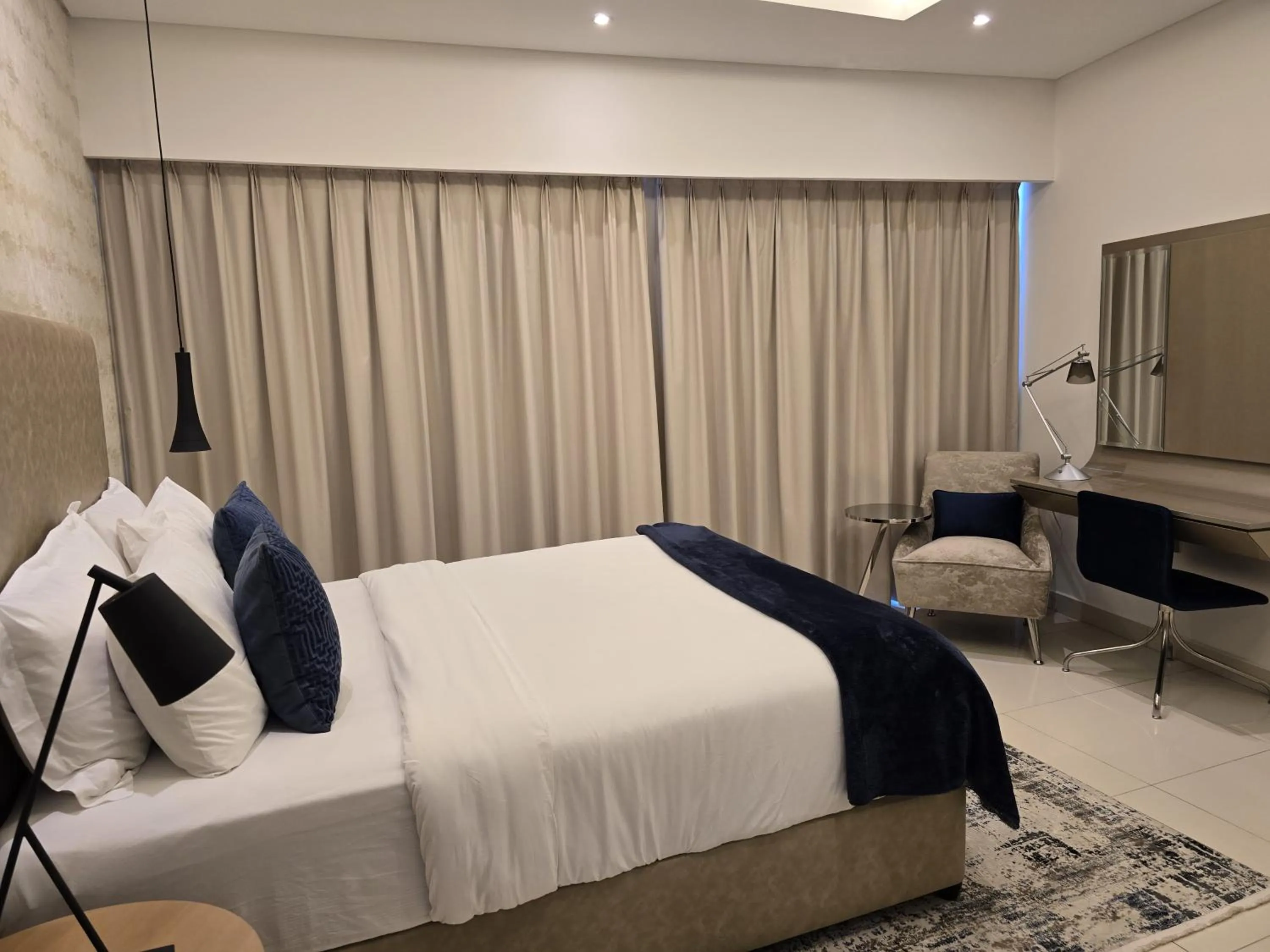 Bed in Quill Residence at Paramount Towers 3 BR Creek View