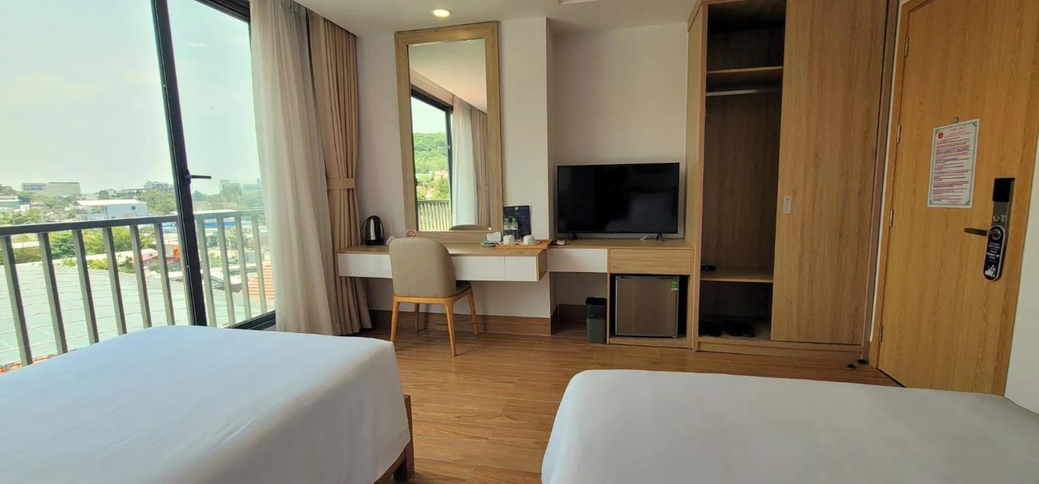 Photo of the whole room, Bed in Rosetta Hotel Phu Quoc