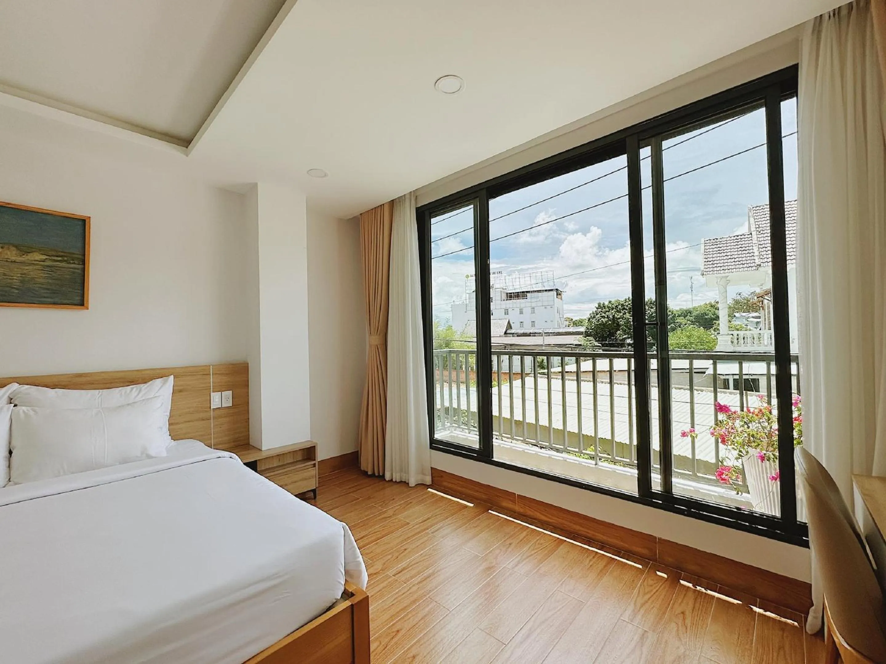 View (from property/room), Bed in Rosetta Hotel Phu Quoc