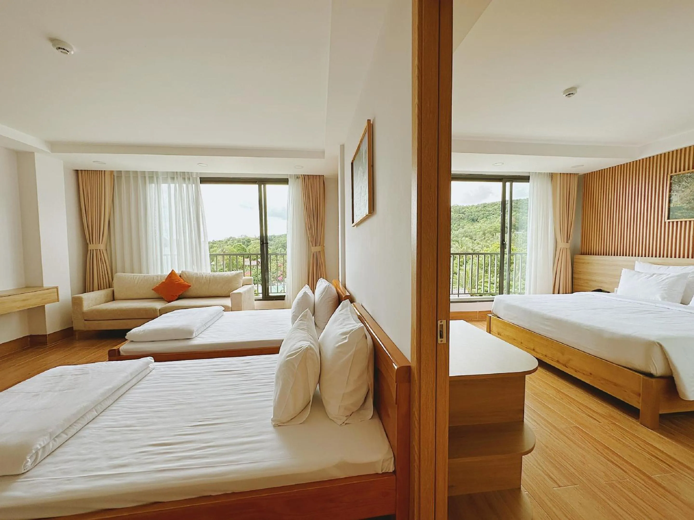 Photo of the whole room, Bed in Rosetta Hotel Phu Quoc