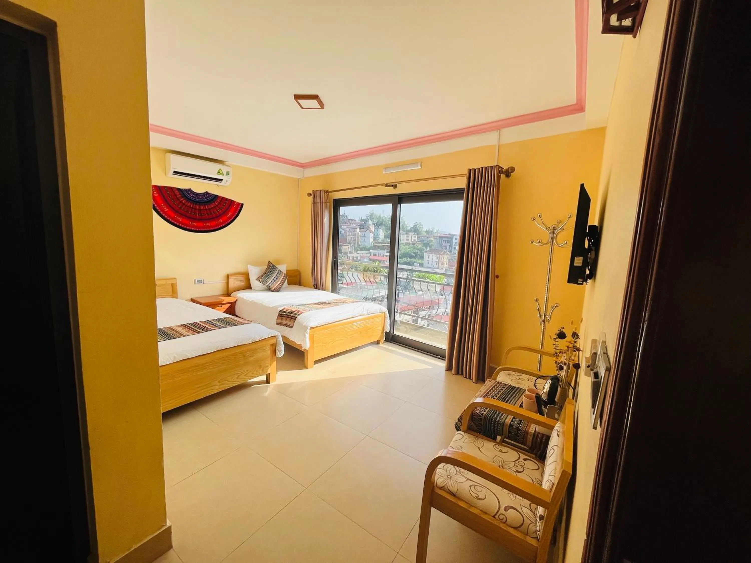 Bed in HAPPY FAMILY HOTEL