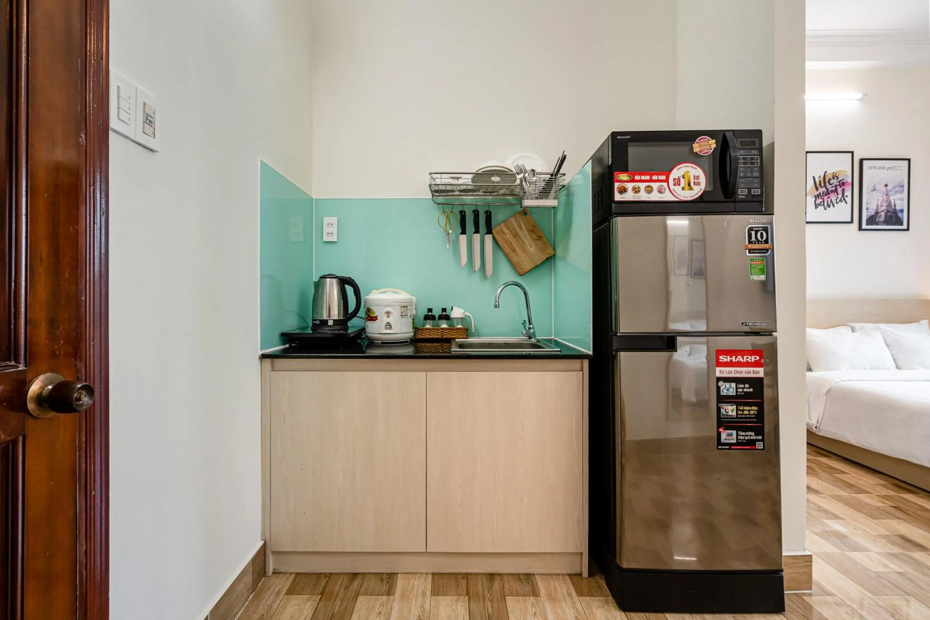 Kitchen or kitchenette, Bed in We Home Nguyen Trai