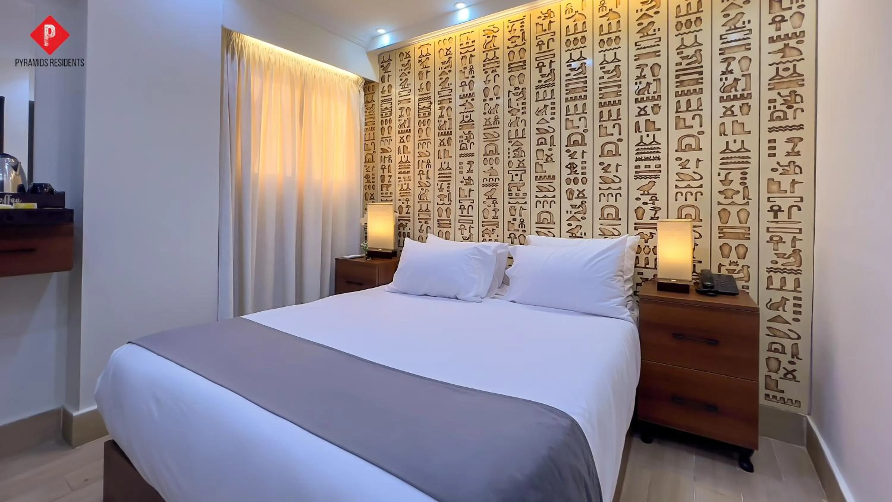 Bed in Pyramids View Guest House