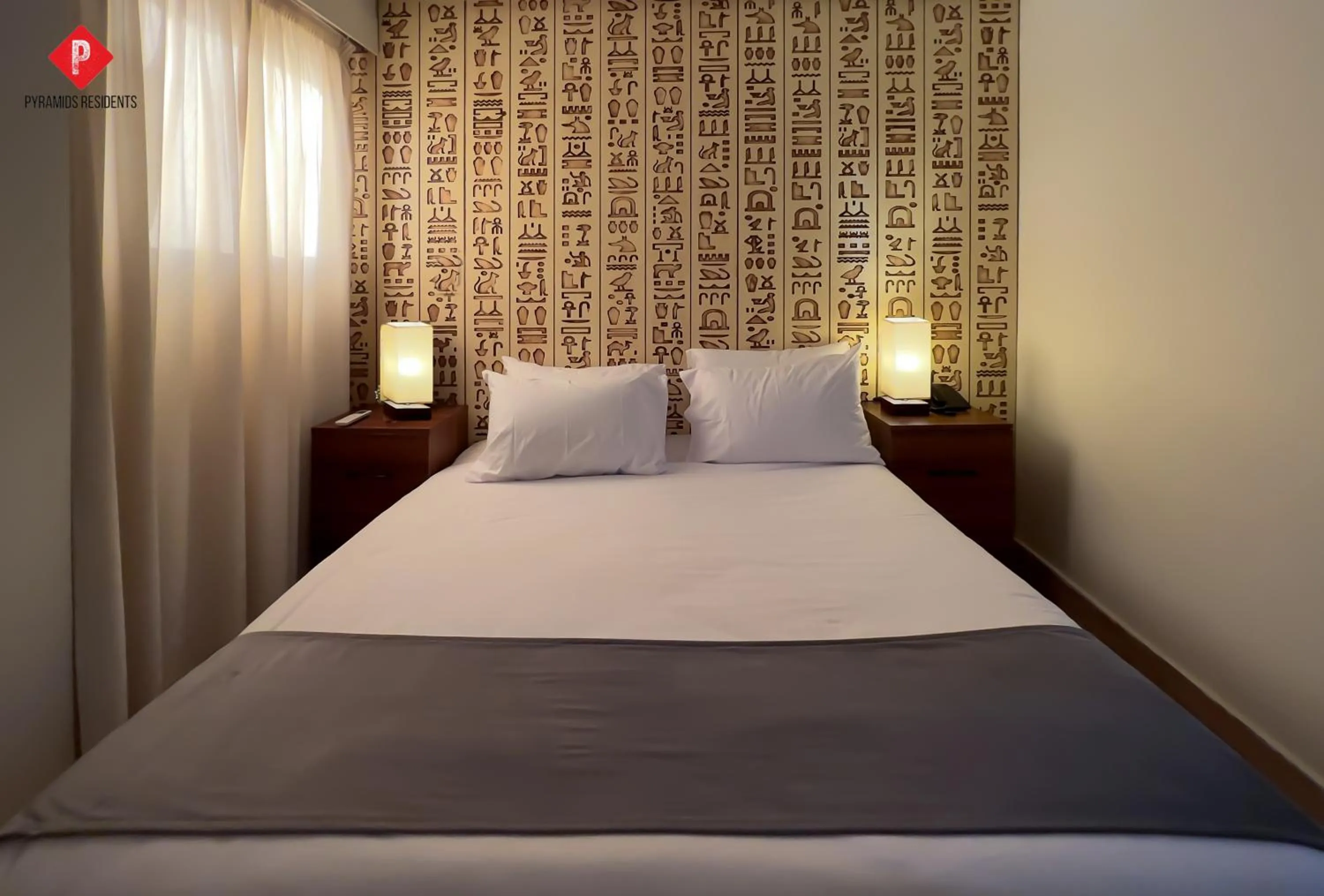 Bed in Pyramids View Guest House