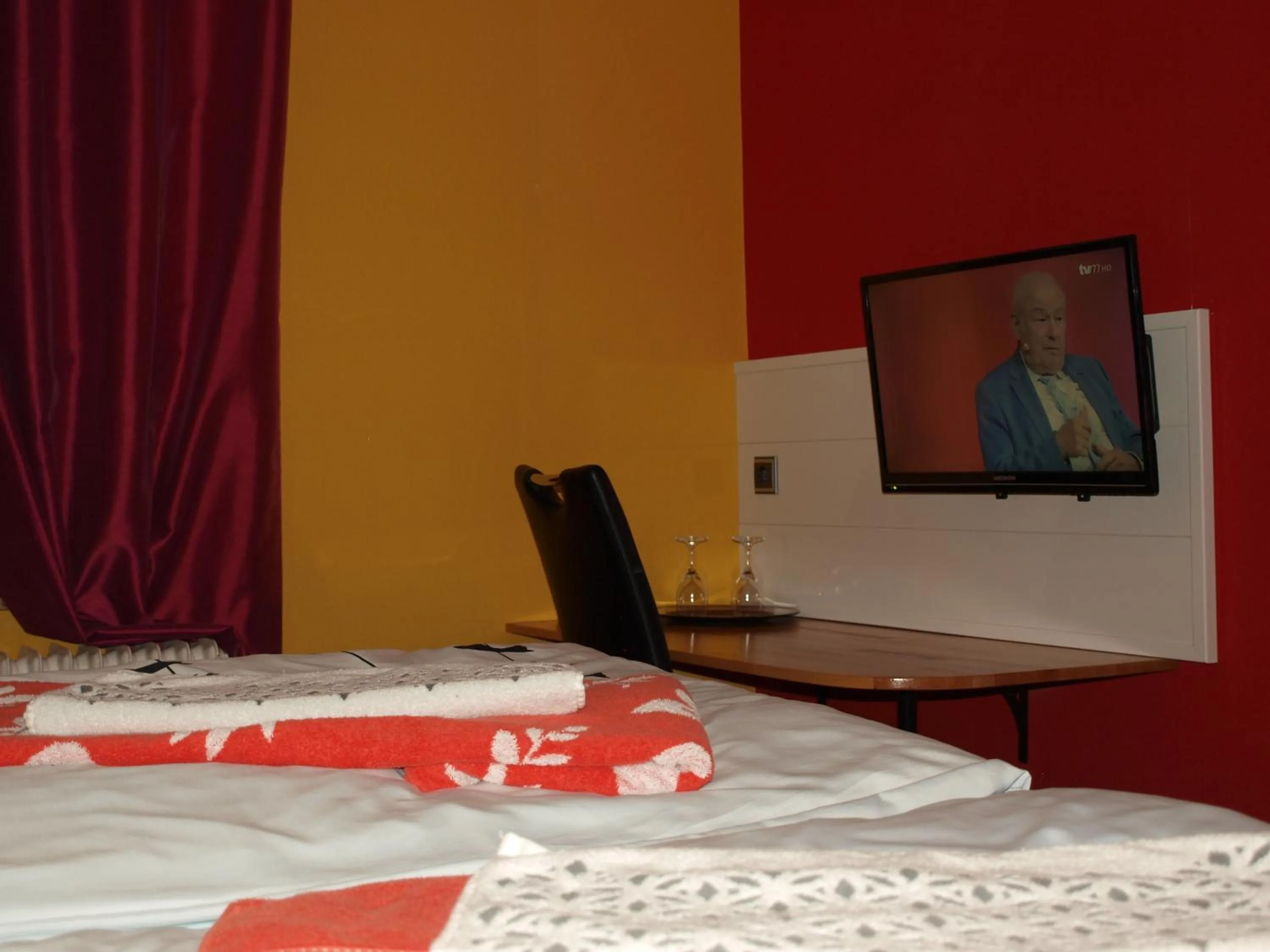 Seating area, Bed in Waldhotel Lemberg