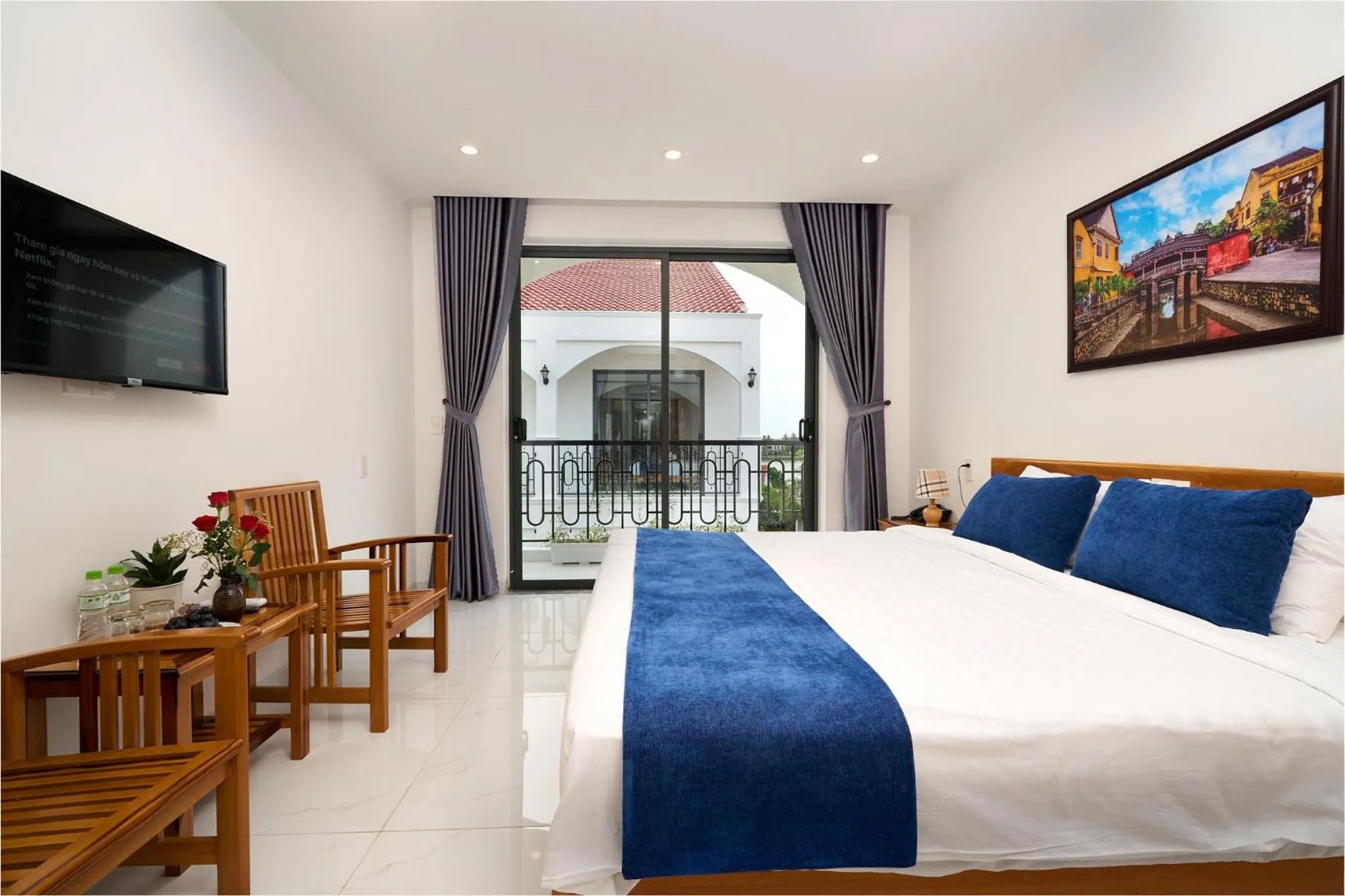 Communal lounge/ TV room, Bed in Hoi An Legend Charm Boutique Hoi An Hotel