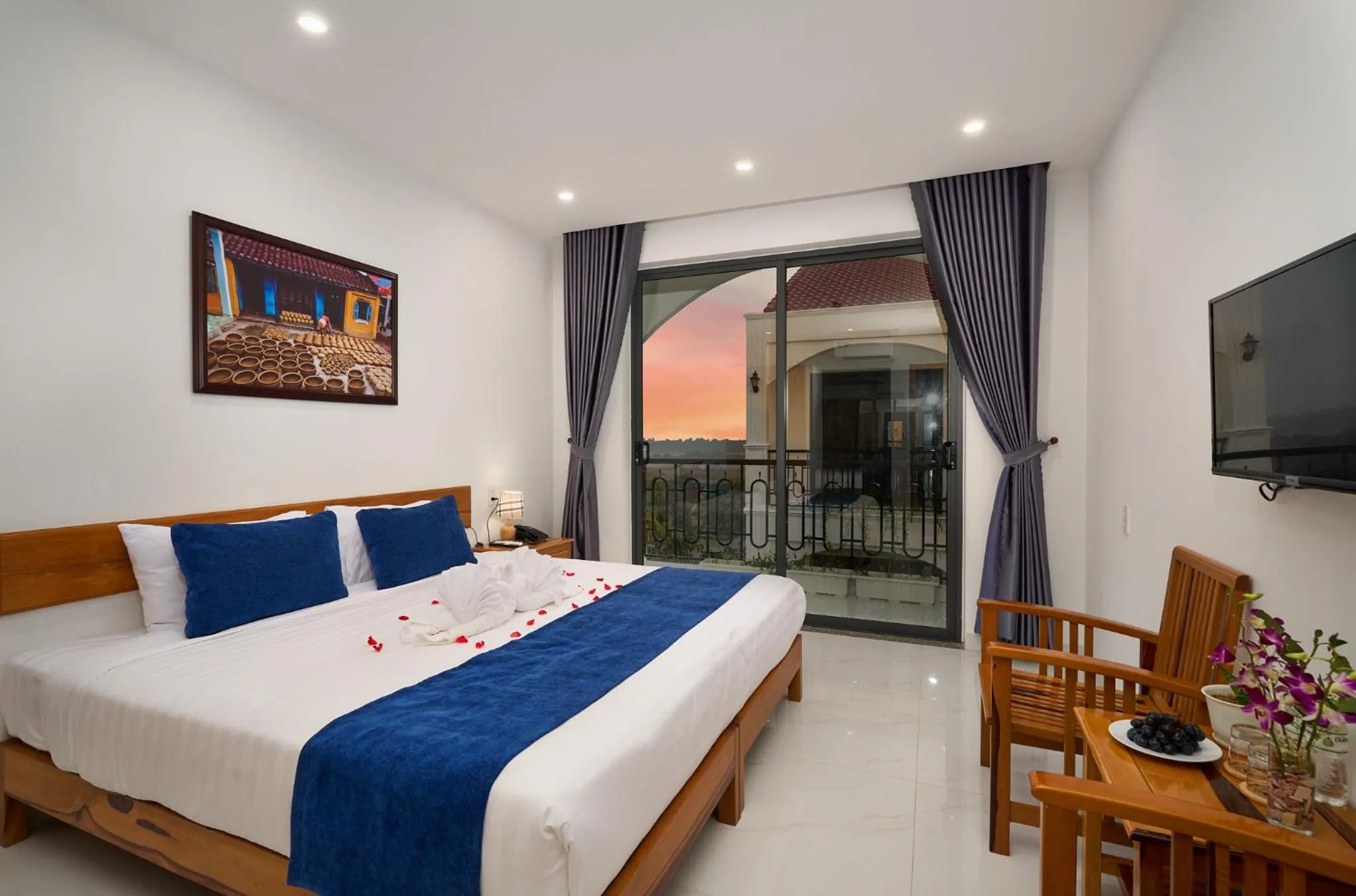 Communal lounge/ TV room, Bed in Hoi An Legend Charm Boutique Hoi An Hotel