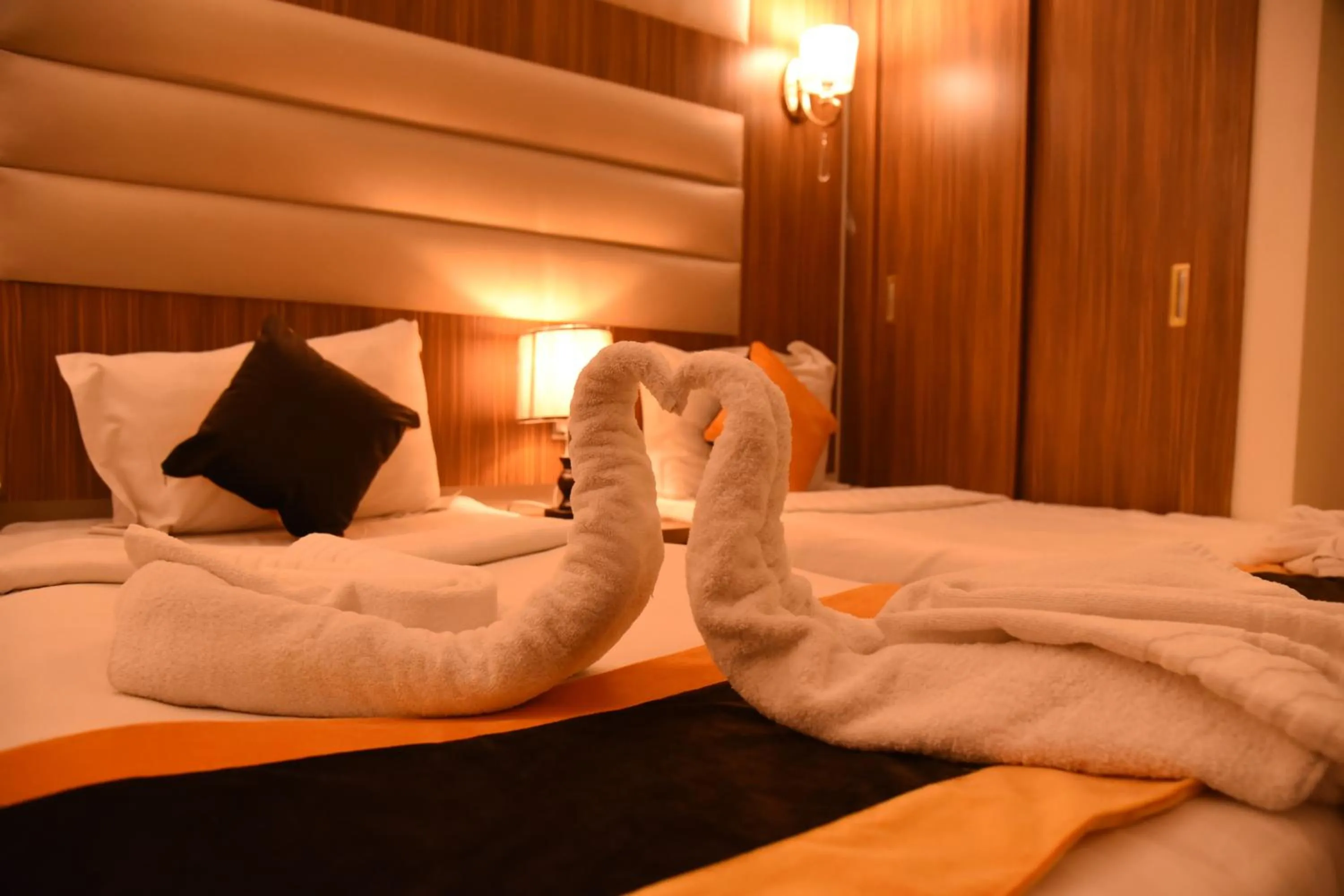 Bed in فندق قصر الاندلس الذهبي - Alandalus golden palace Hotel