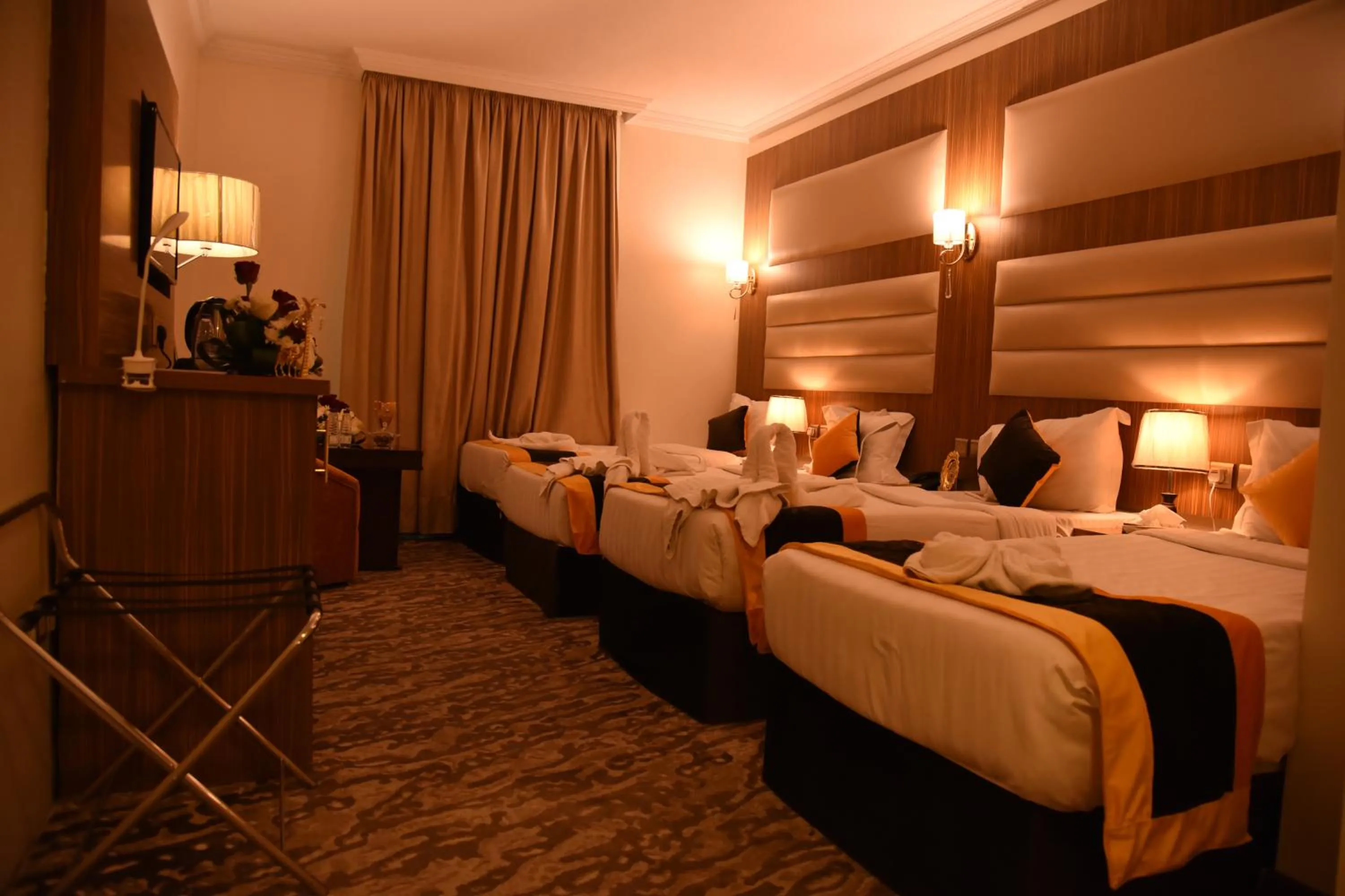 Bed in فندق قصر الاندلس الذهبي - Alandalus golden palace Hotel