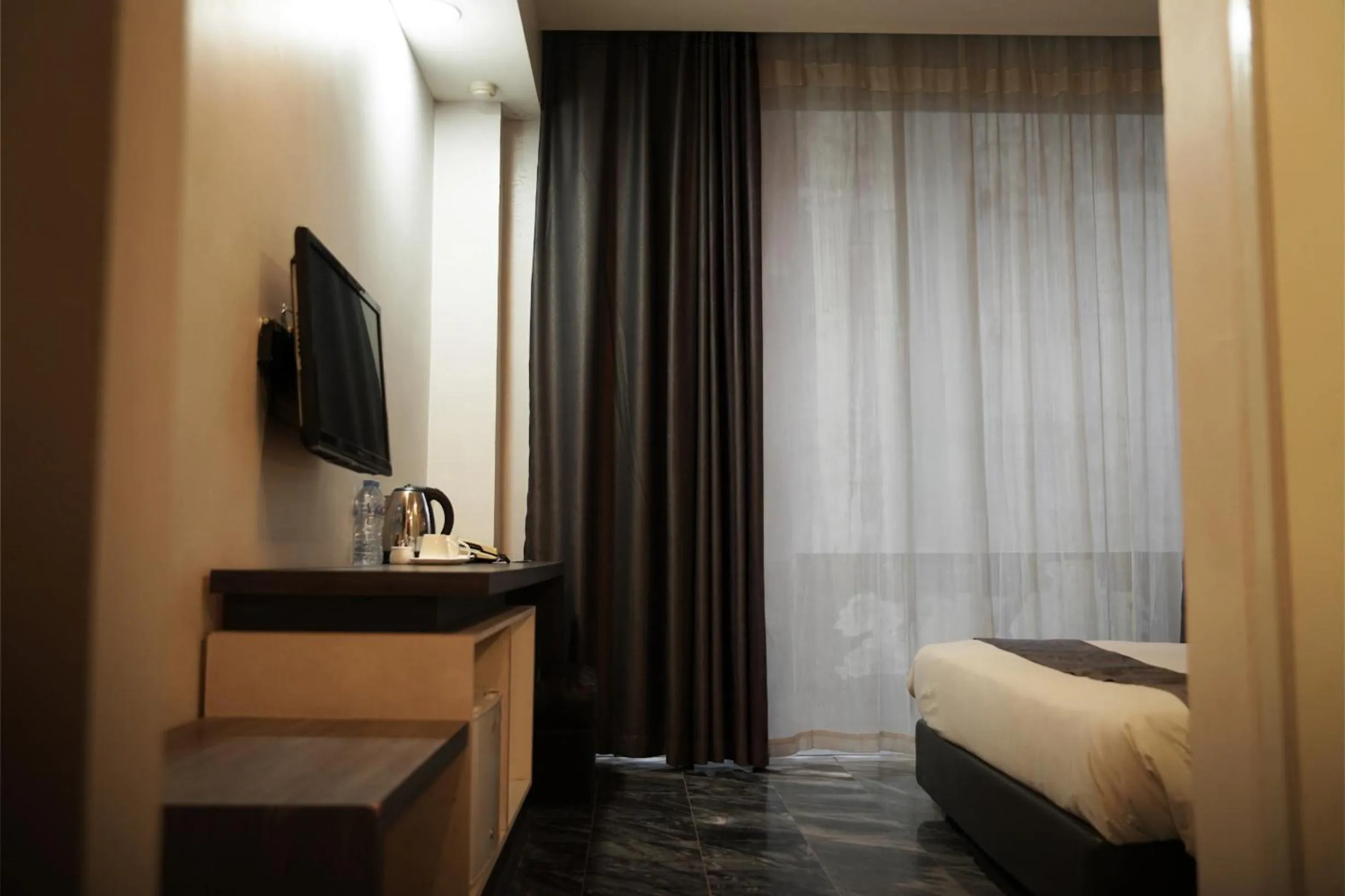 Bed in Dreamtel Jakarta