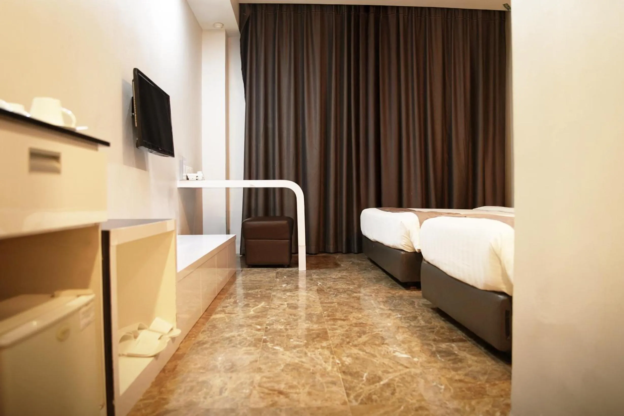 Bed in Dreamtel Jakarta