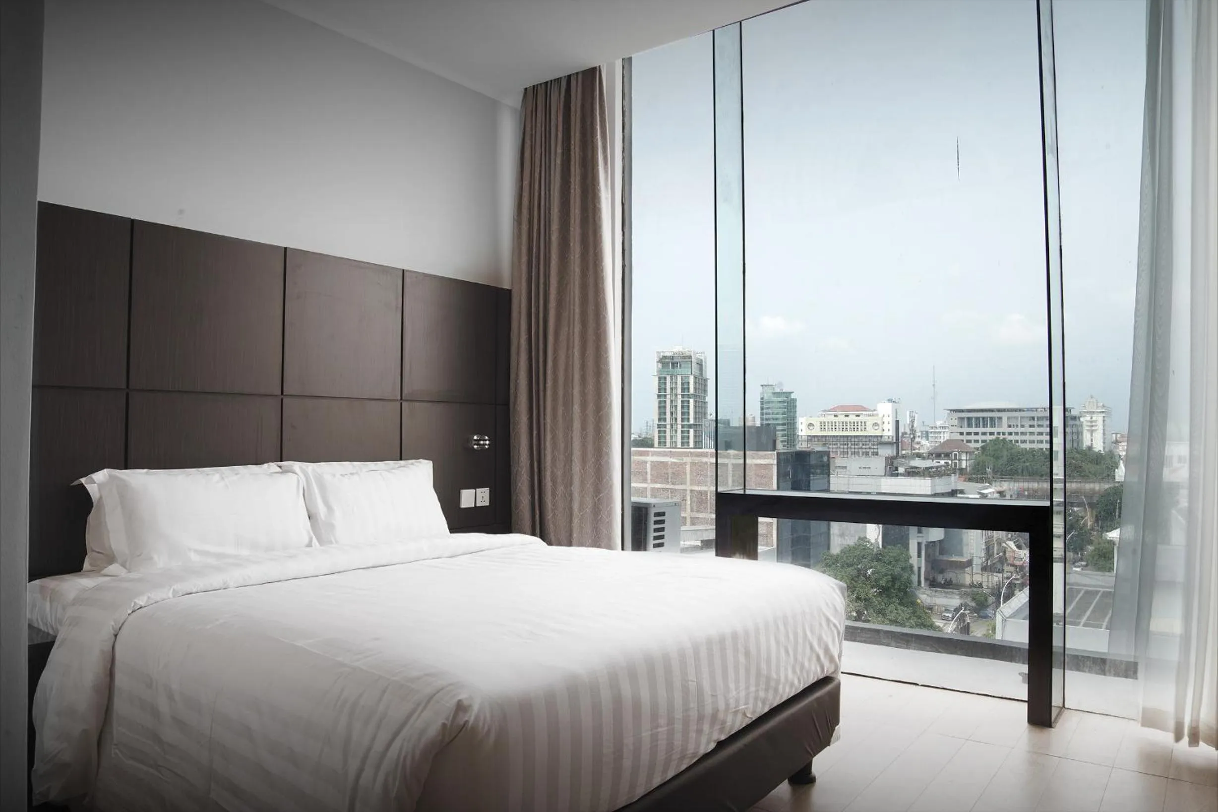 View (from property/room), Bed in Dreamtel Jakarta