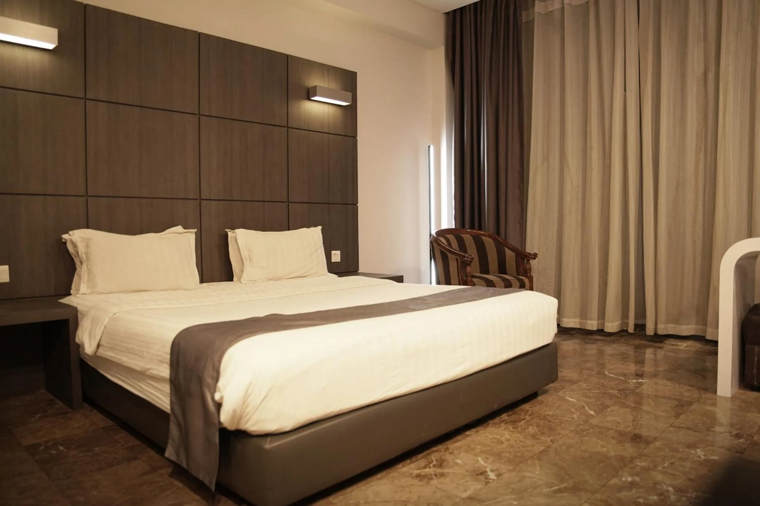 Bed in Dreamtel Jakarta