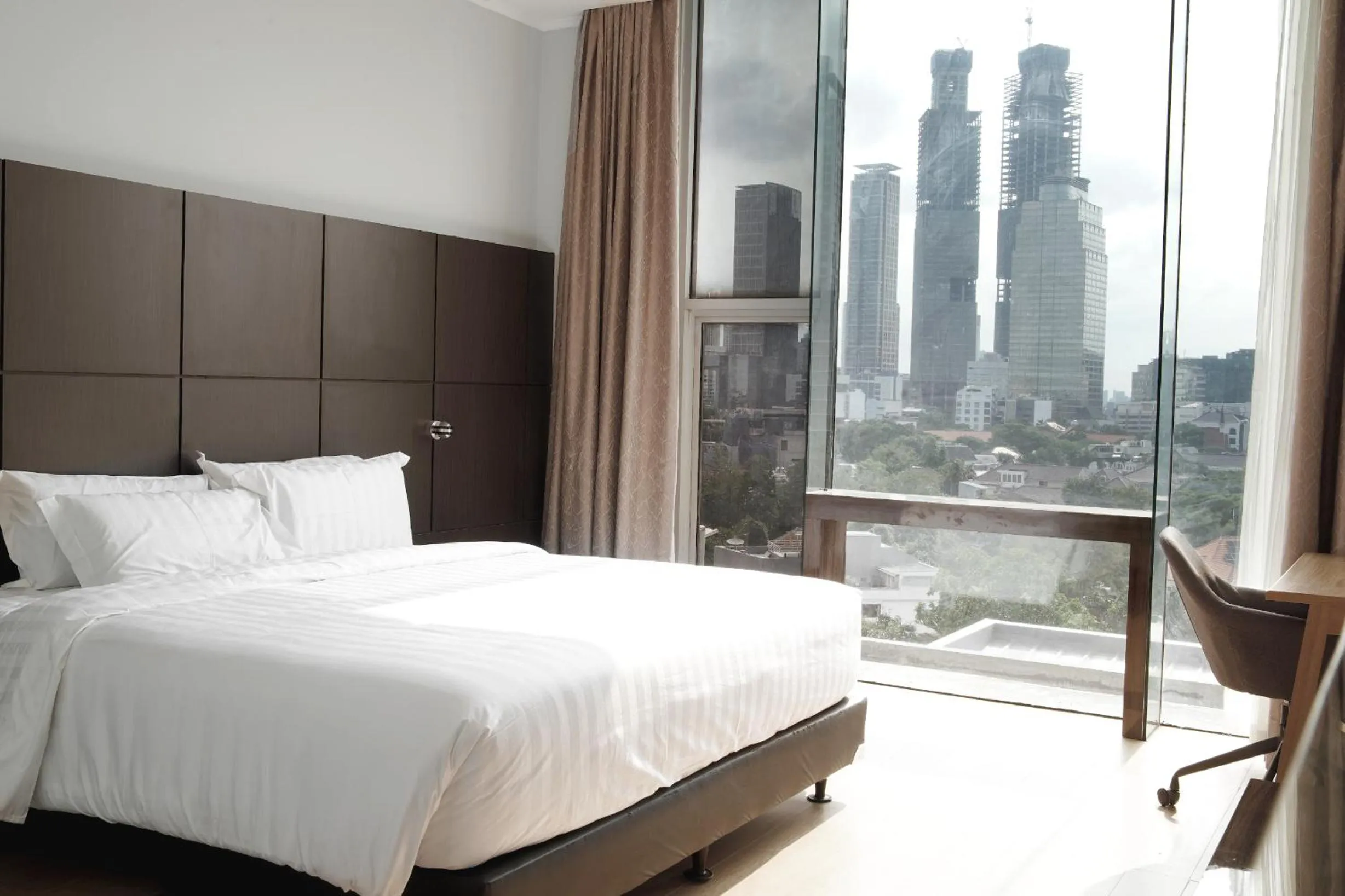 View (from property/room), Bed in Dreamtel Jakarta