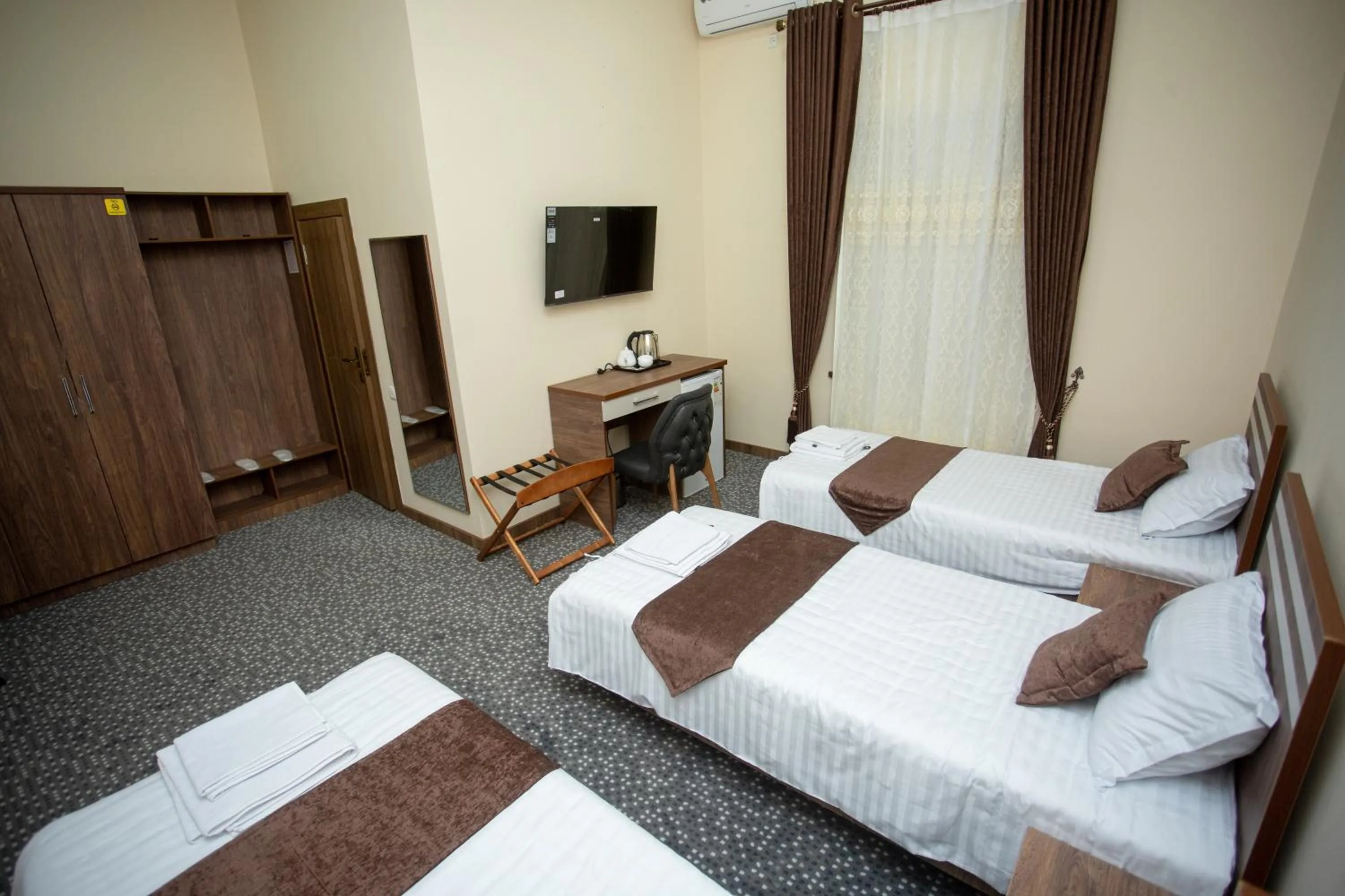 Bed in Rayyan Hotel Samarkand