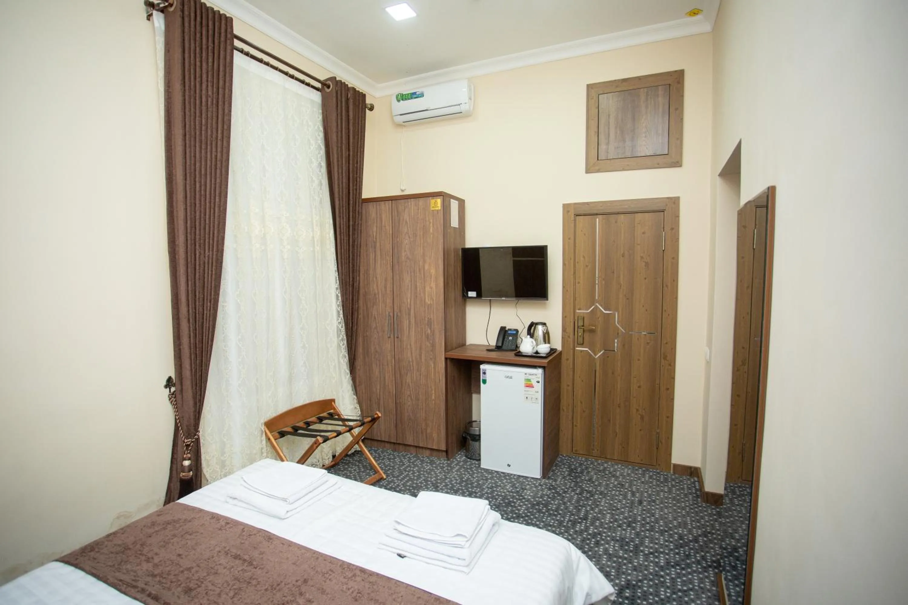 Bed in Rayyan Hotel Samarkand