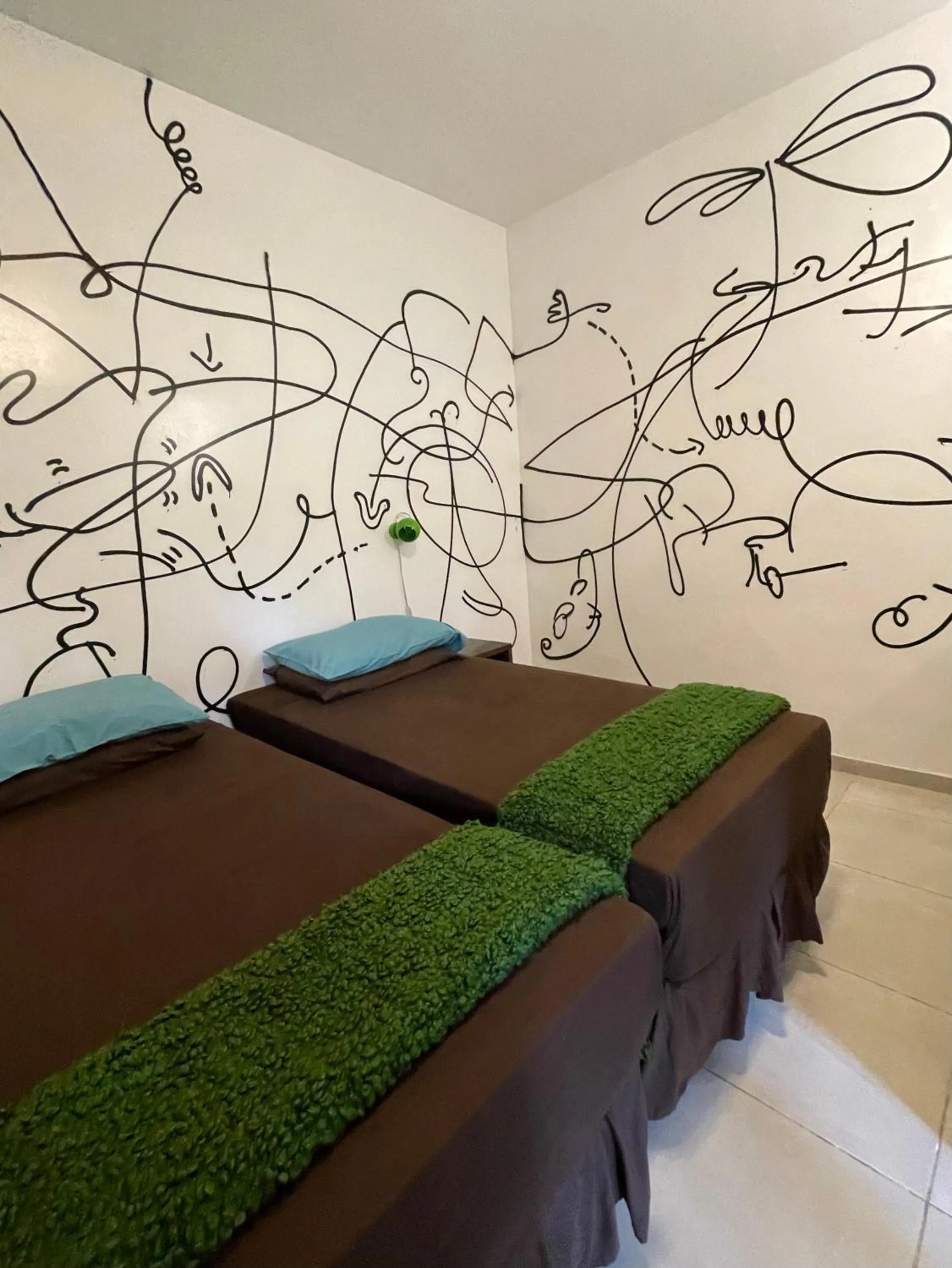 Bed in casaJOMO Art, Food & Music B&B