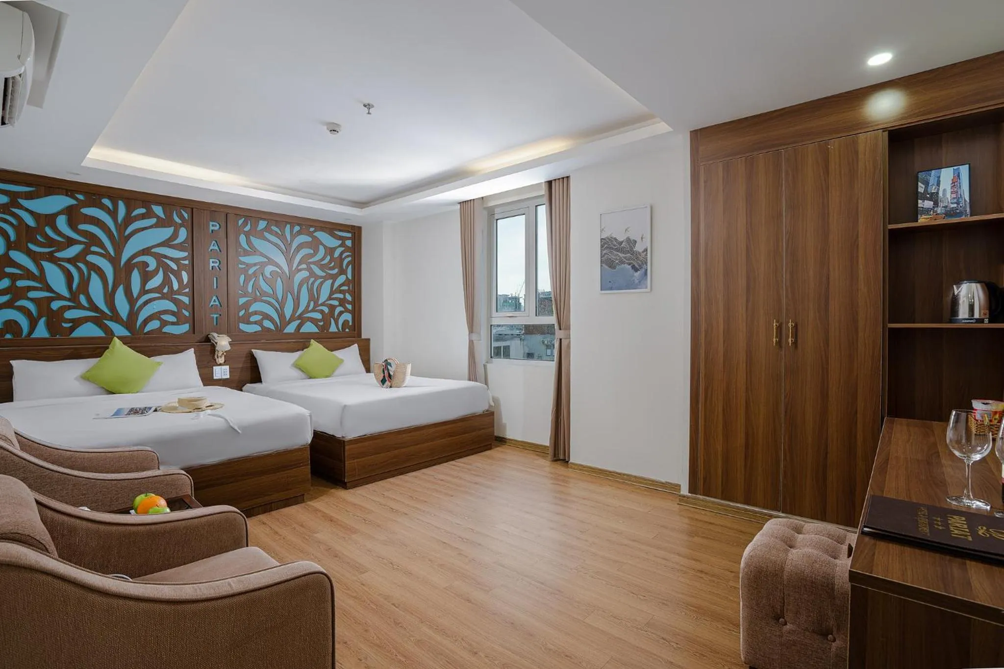 Bed in Pariat River Front Hotel