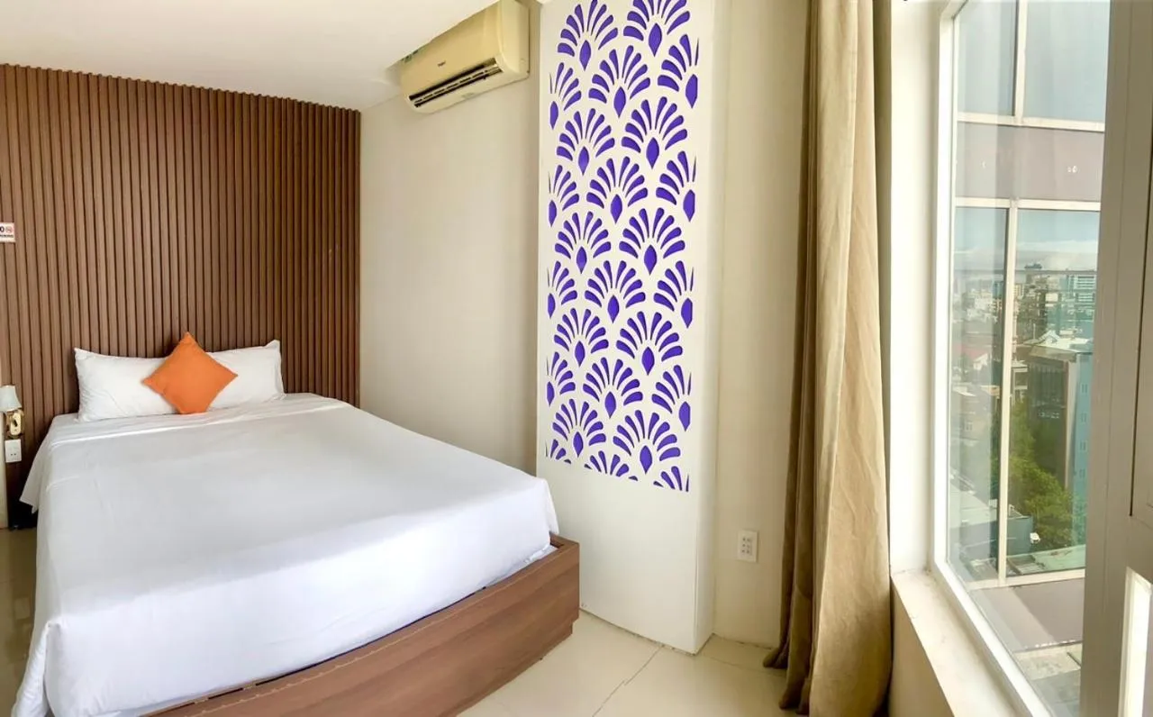 Bed in Pariat River Front Hotel