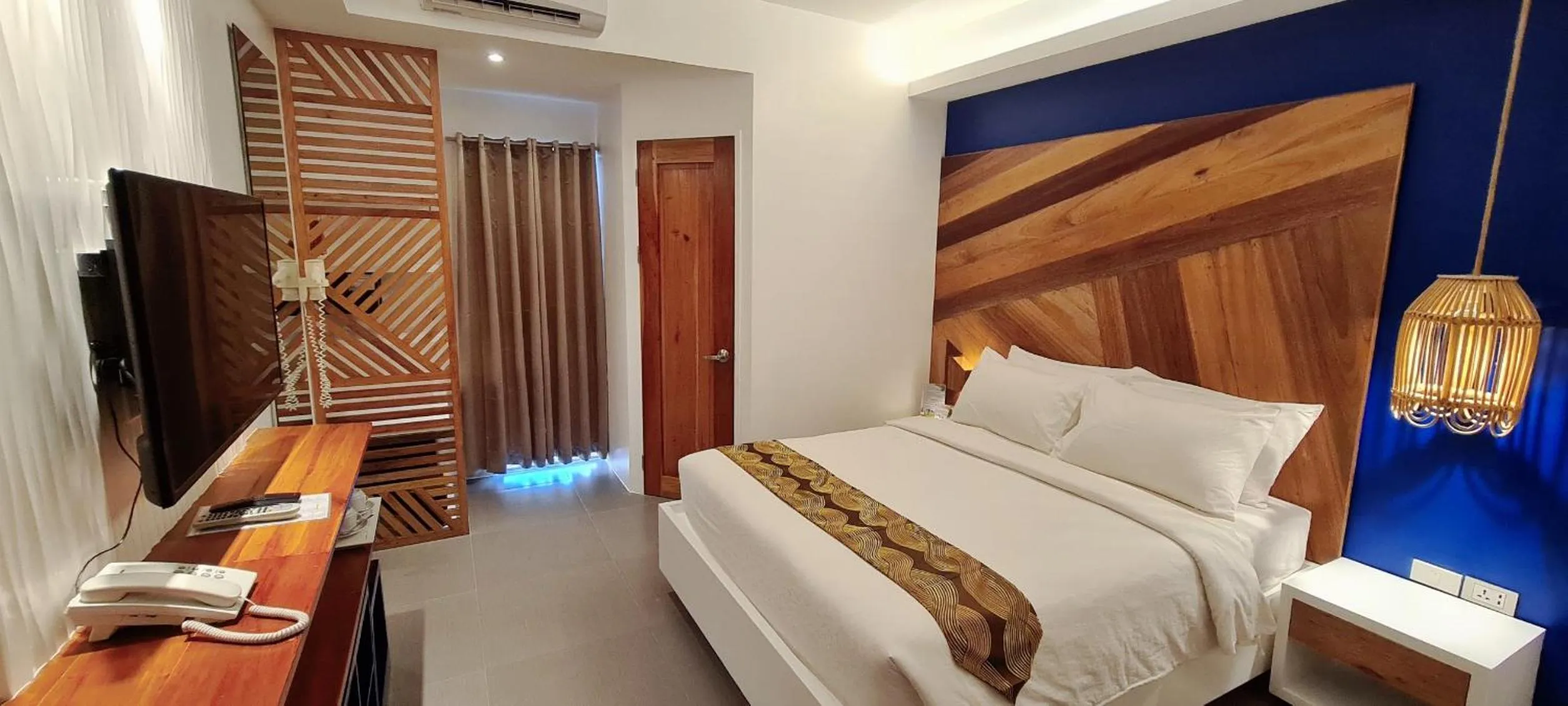 Bed in The Paragon Boracay Suites