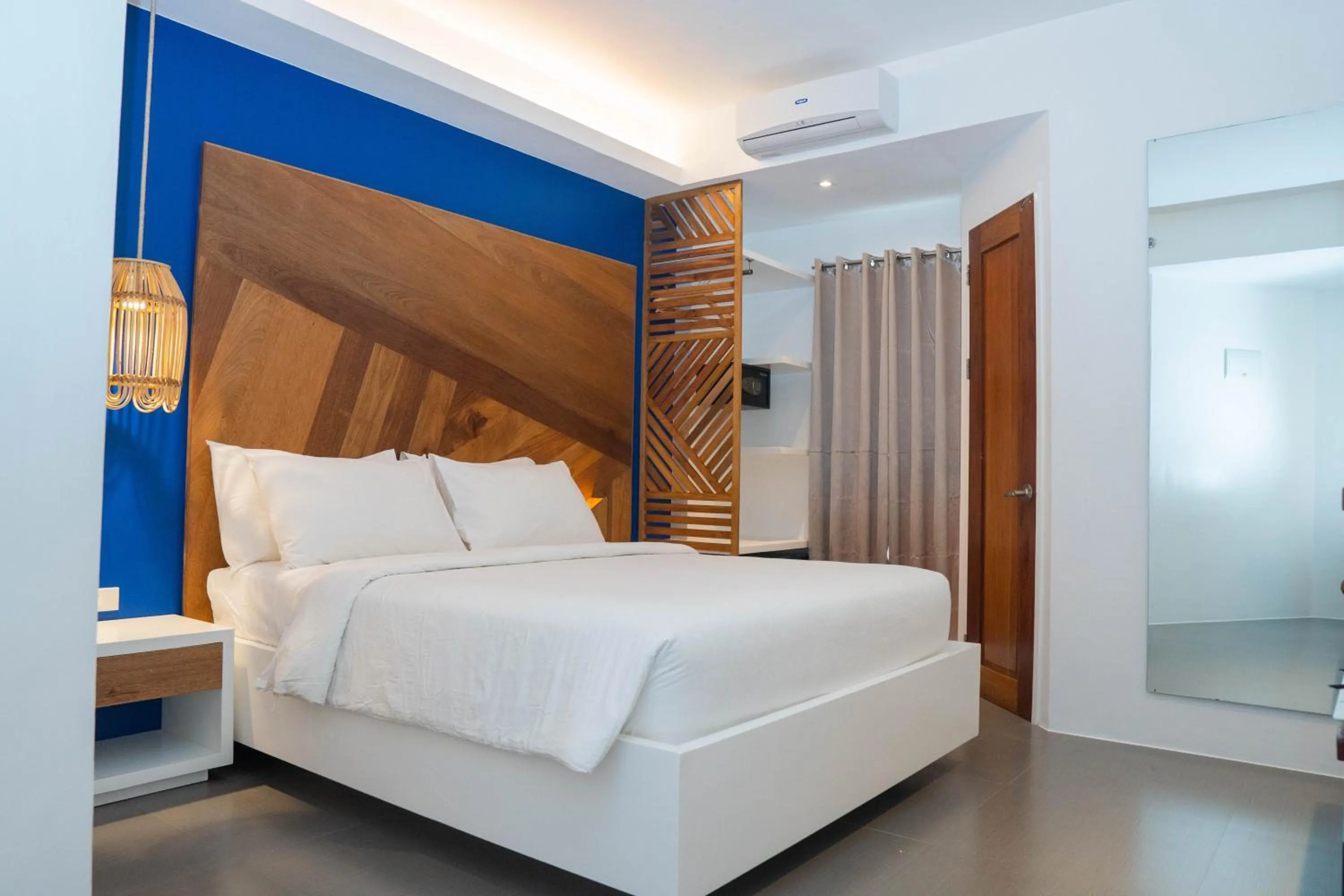 Bed in The Paragon Boracay Suites