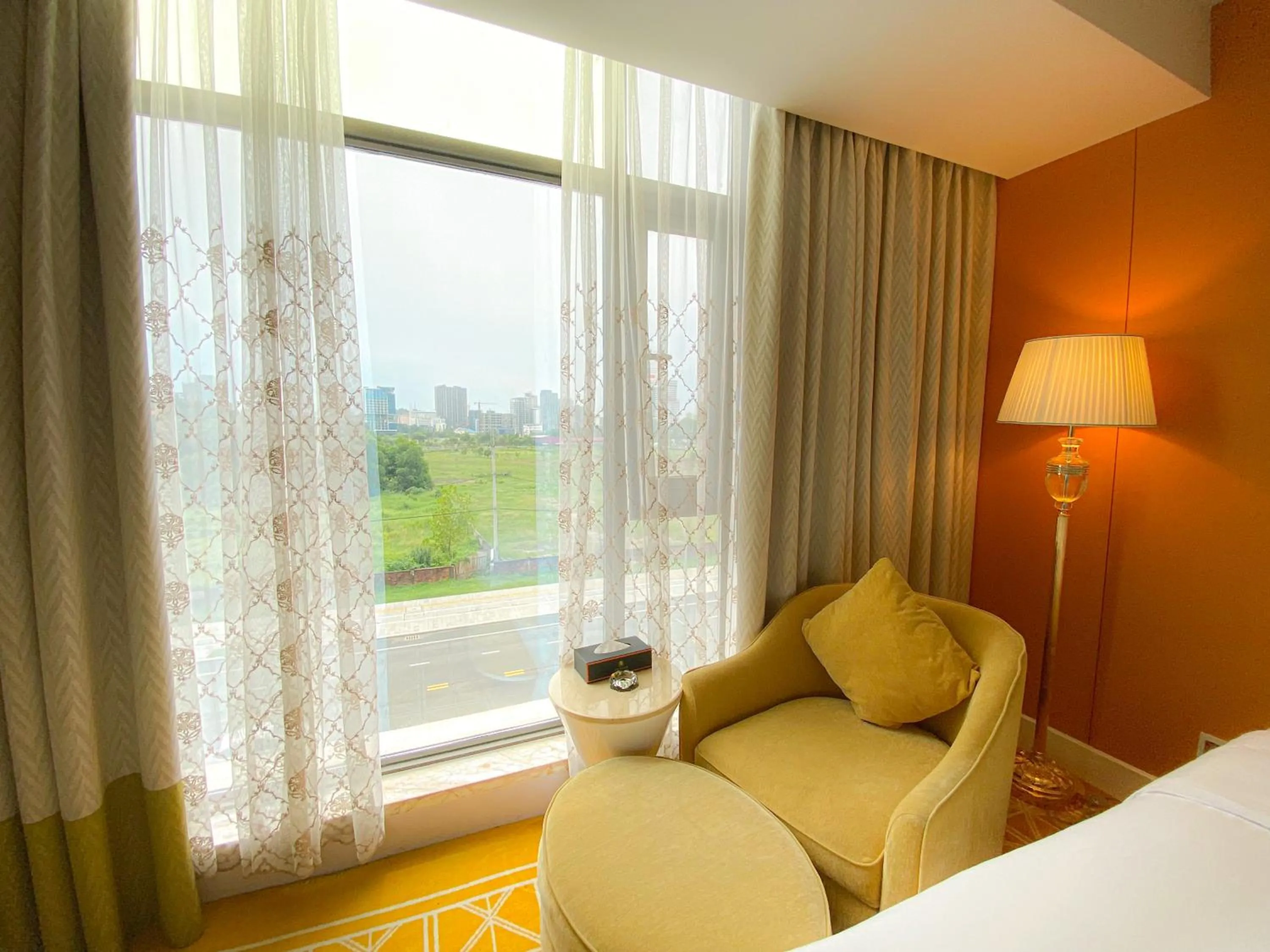 View (from property/room), Bed in Continental Xin Hao Hotel and Resort 洲际新濠酒店