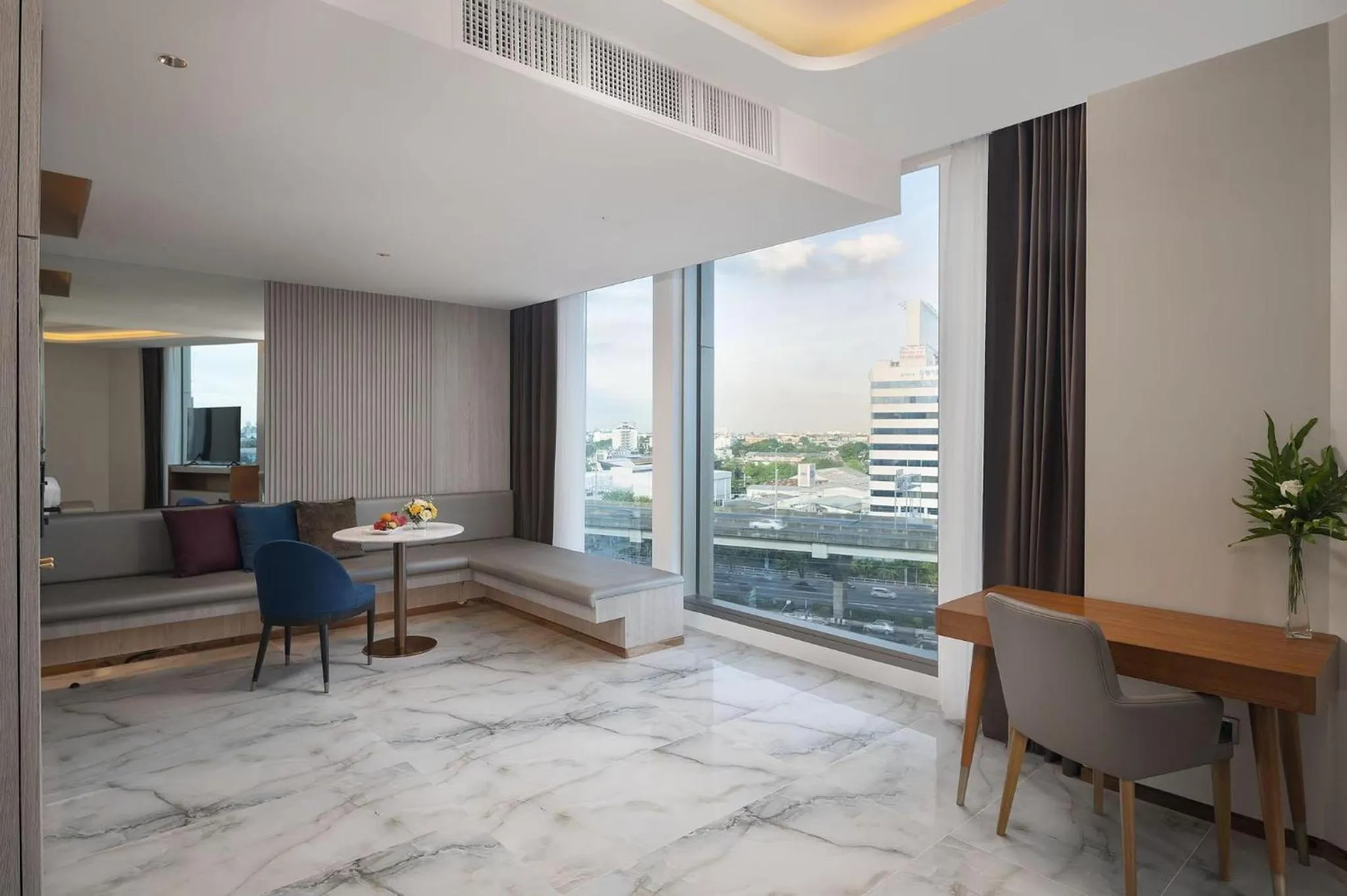 Seating area in Asawin Grand Convention Hotel