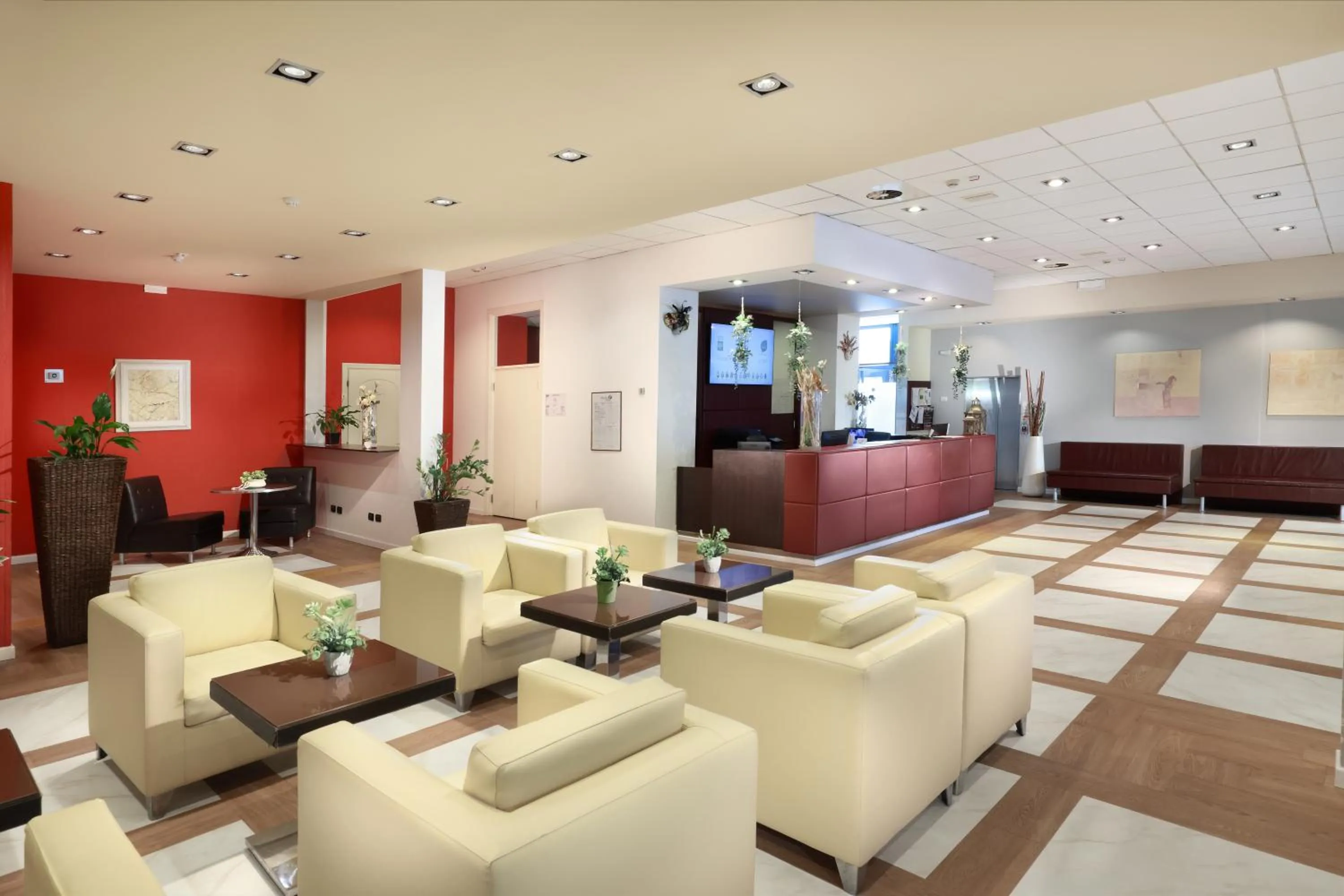 Lobby or reception in Tuscany Inn