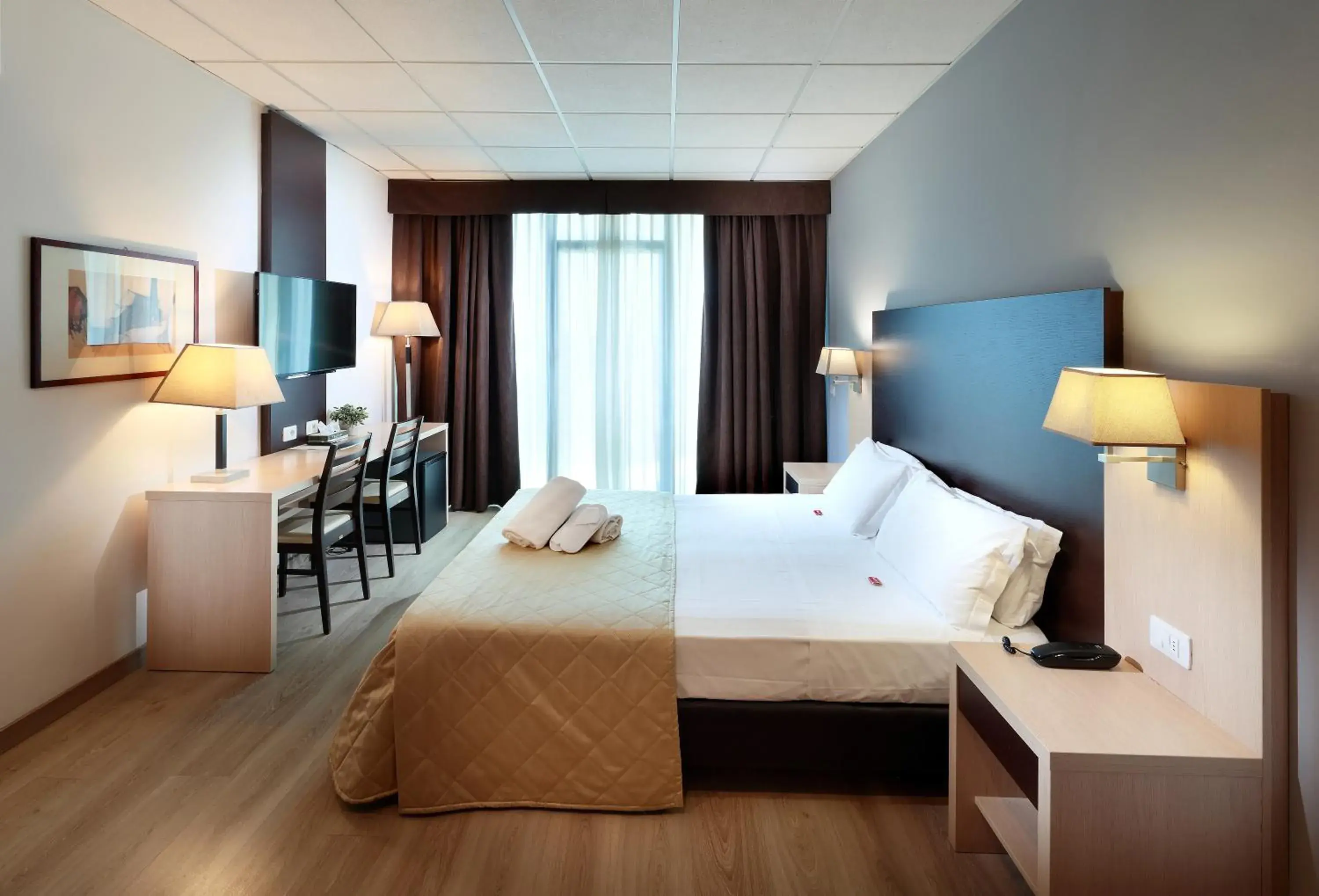 Superior Triple Room in Tuscany Inn Superior Triple Room in Tuscany Inn