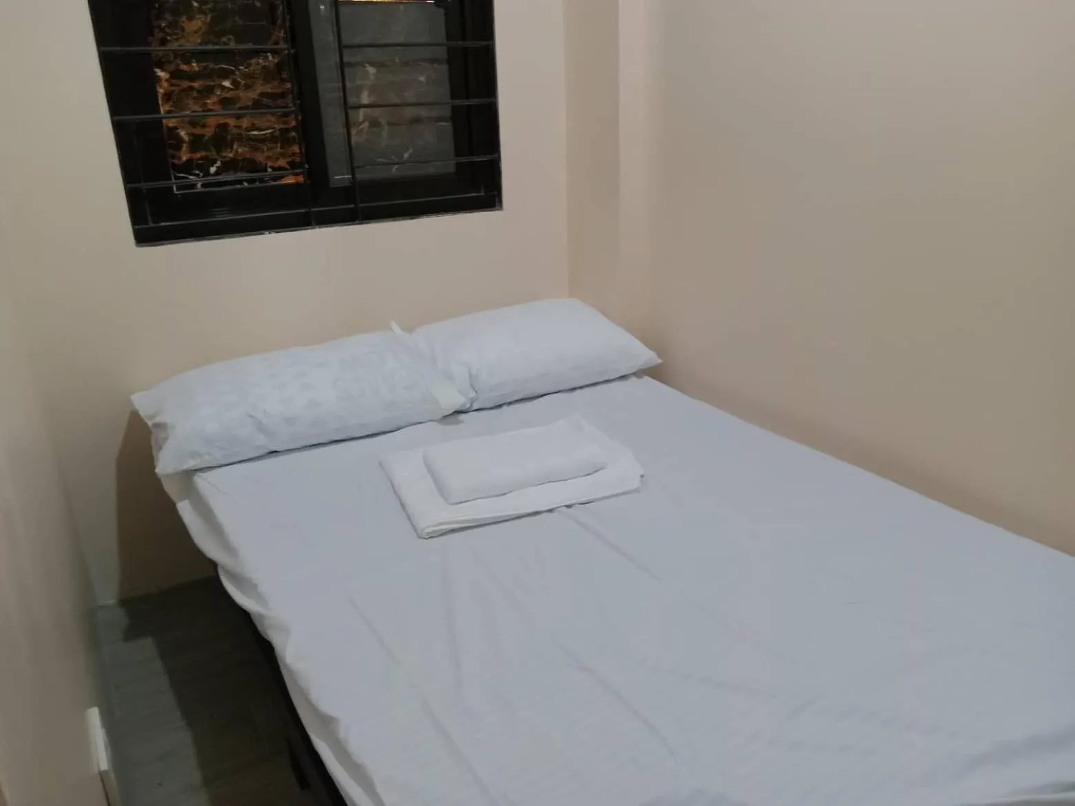 Bed in RedDoorz @ JJ & KAYE APARTMENT