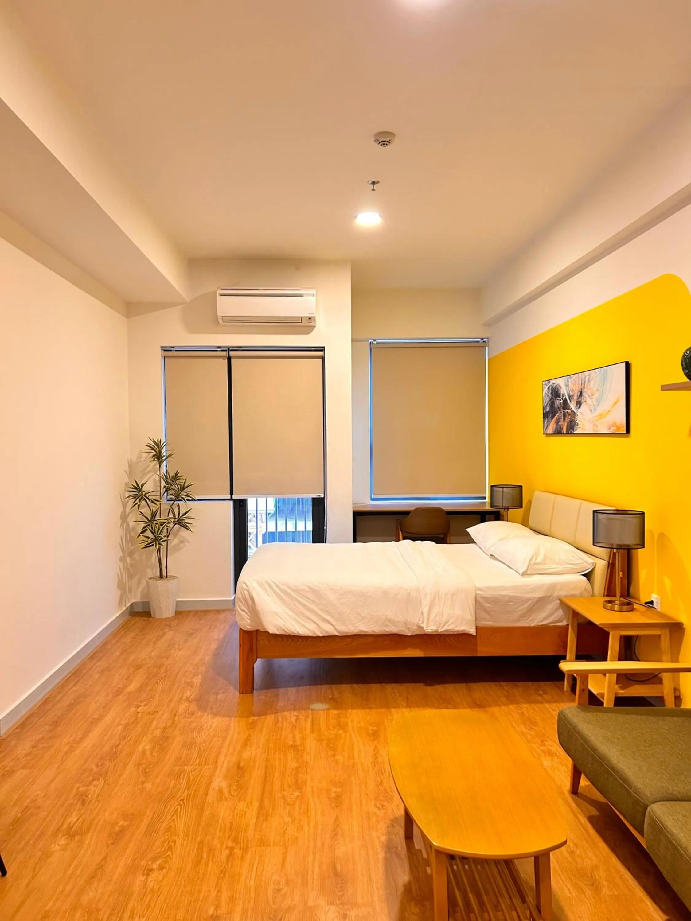 Bed in Soho residence studio apartment