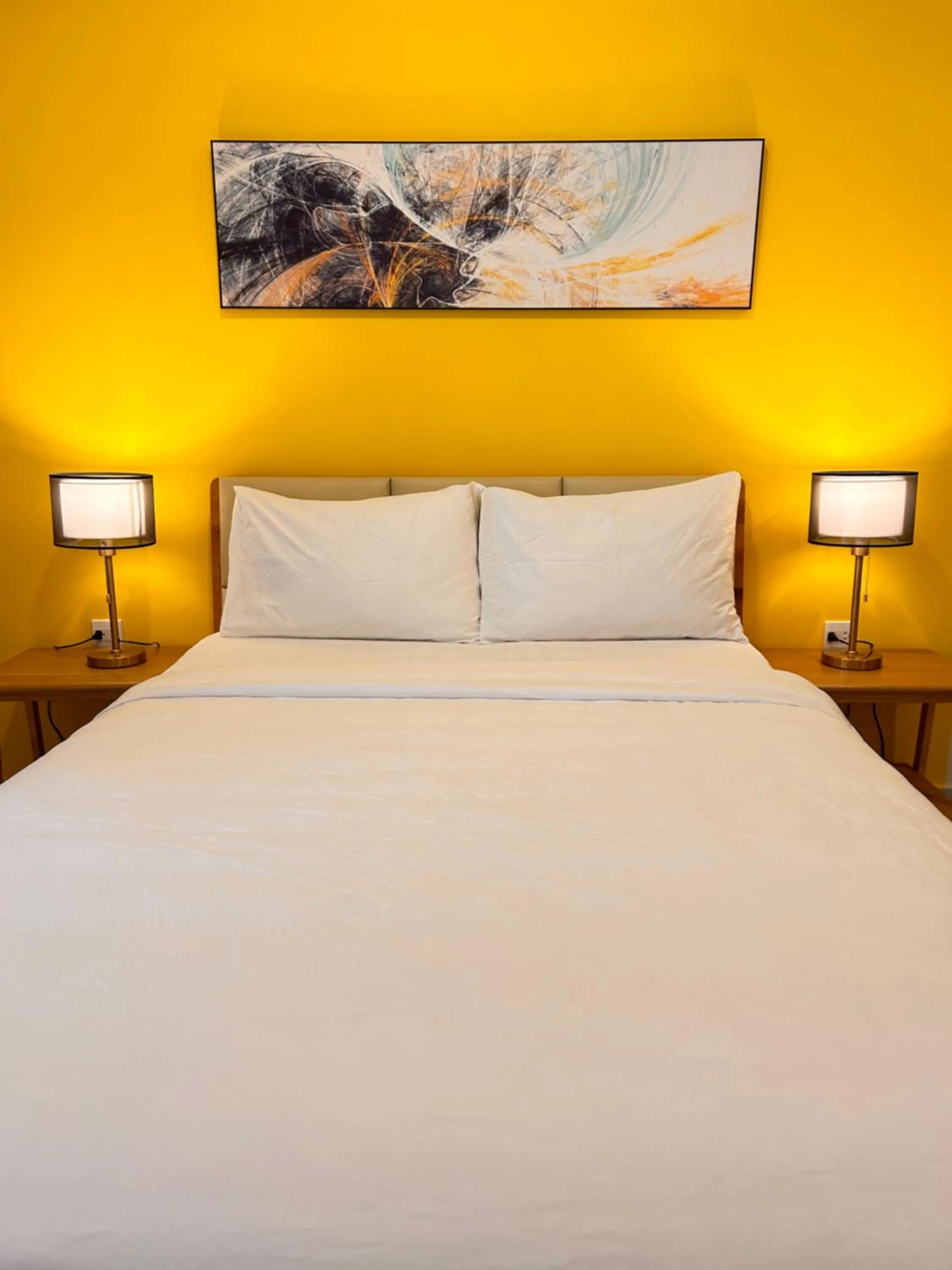 Bed in Soho residence studio apartment