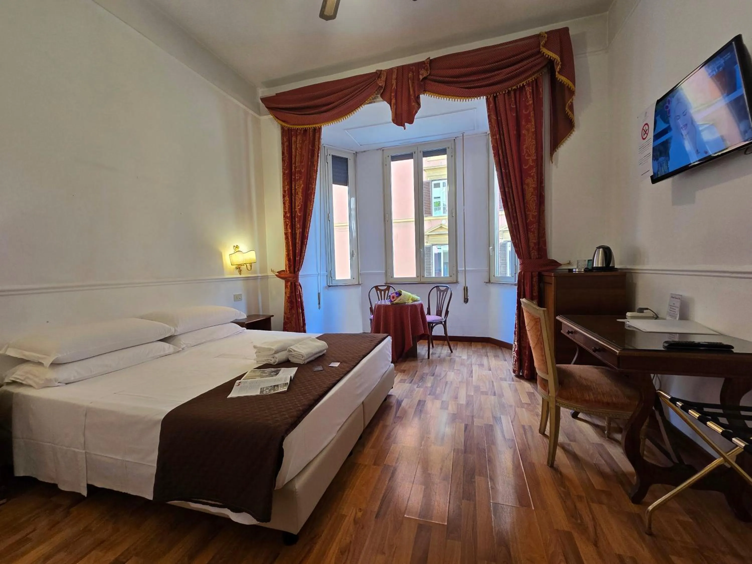 Photo of the whole room, Bed in Hotel Porta Pia