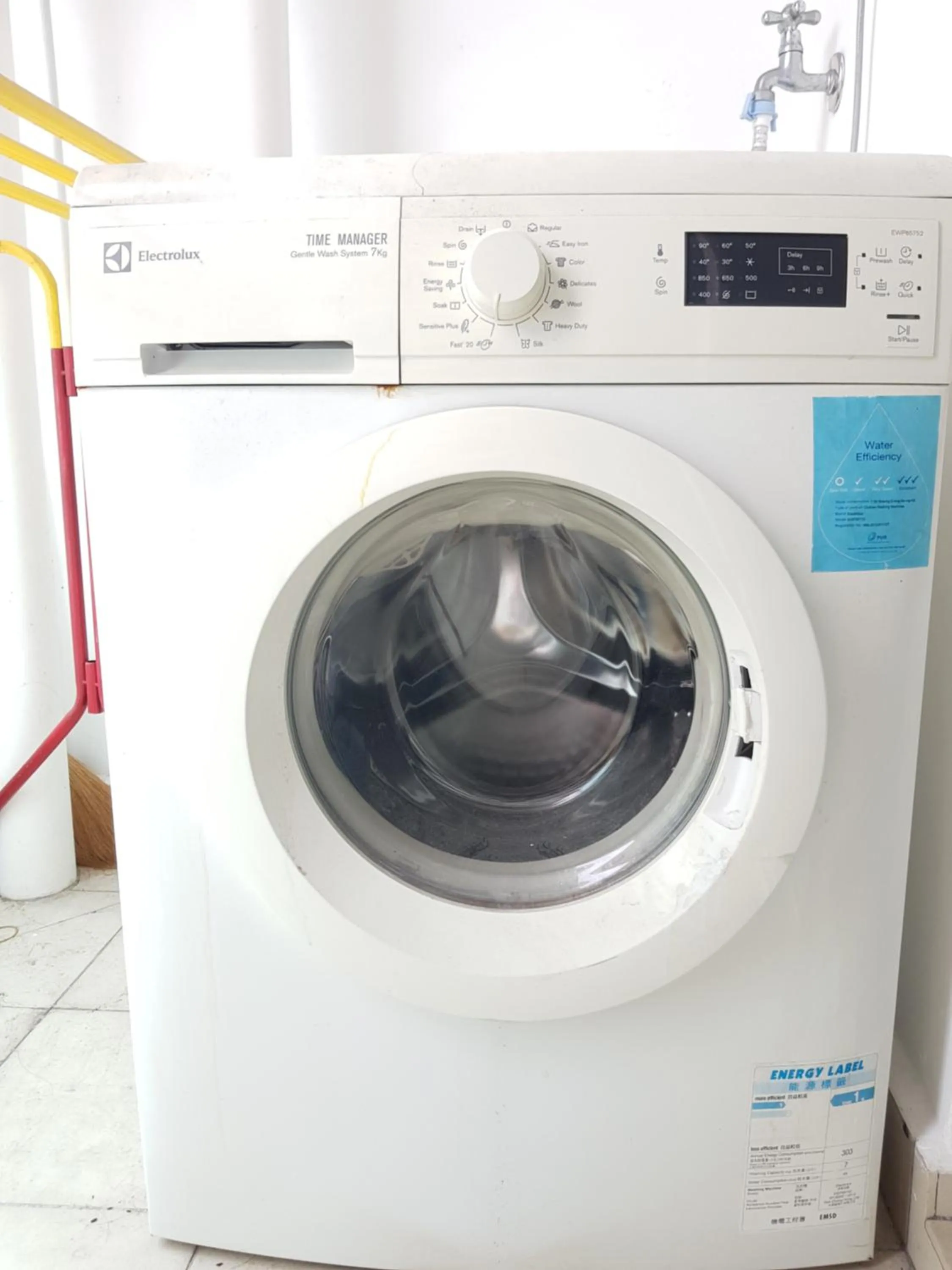 washing machine in Mansion One Suite by stayCATion Homestay