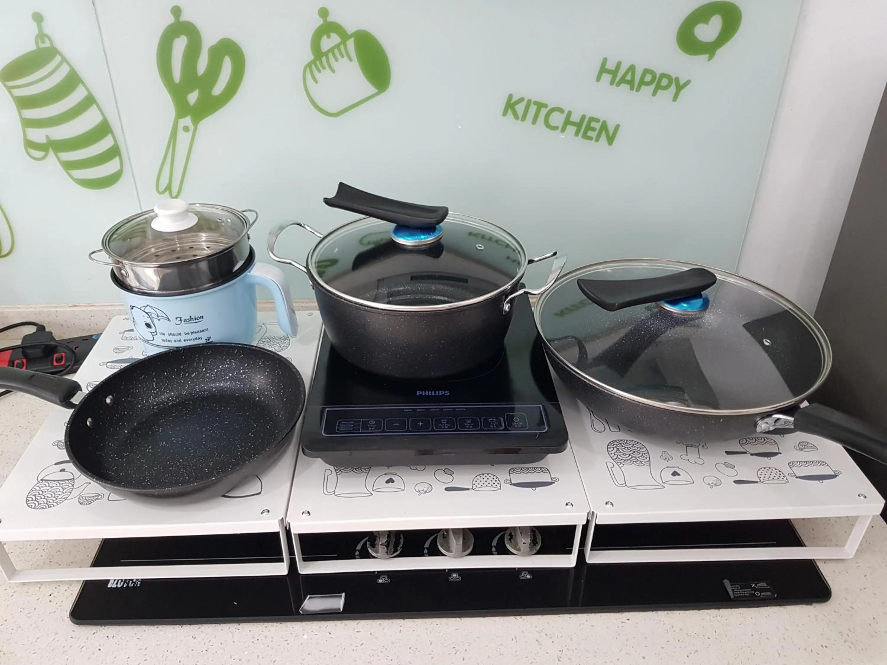 Kitchen or kitchenette in Mansion One Suite by stayCATion Homestay