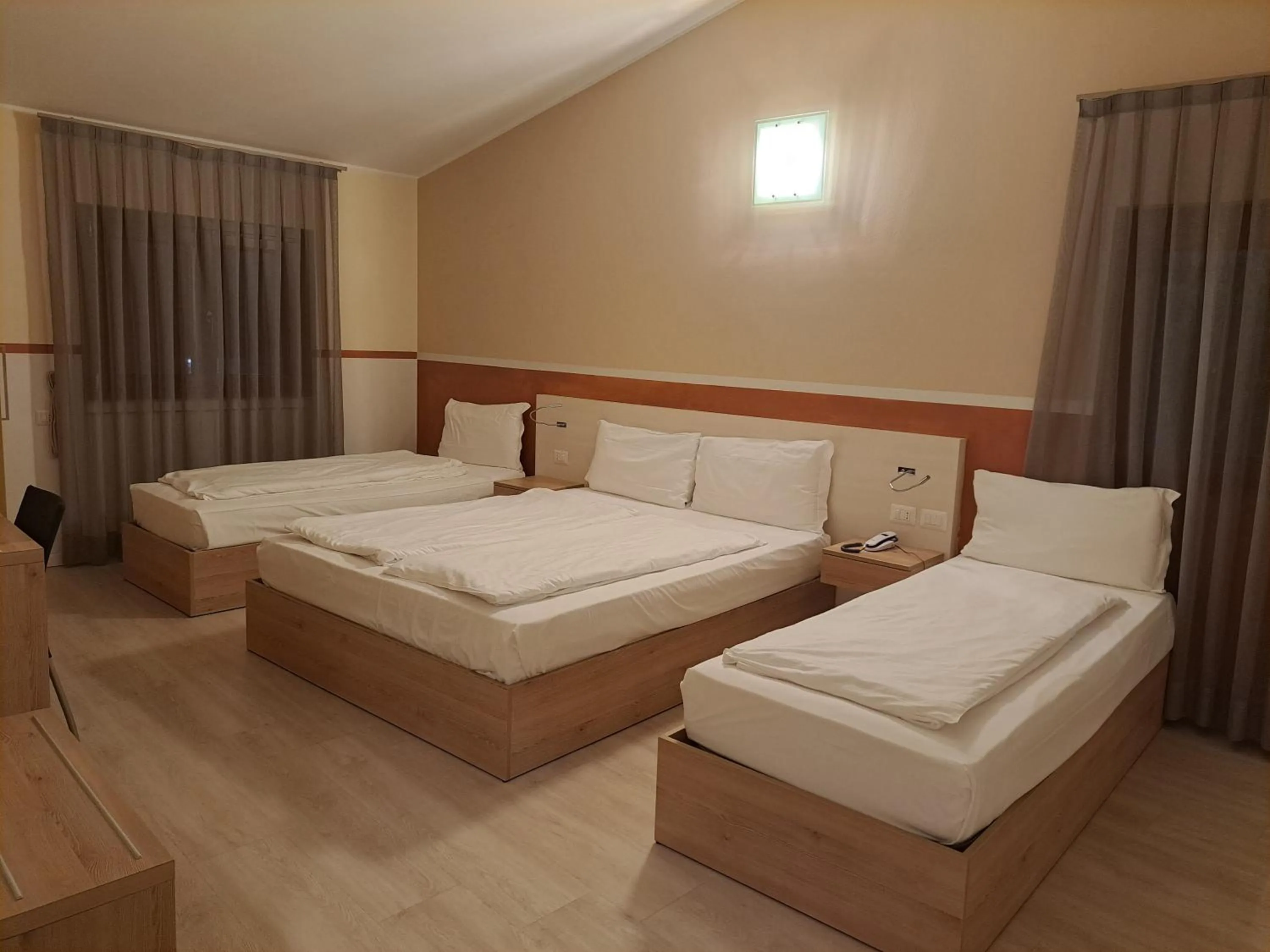 Bed in Hotel Dogana