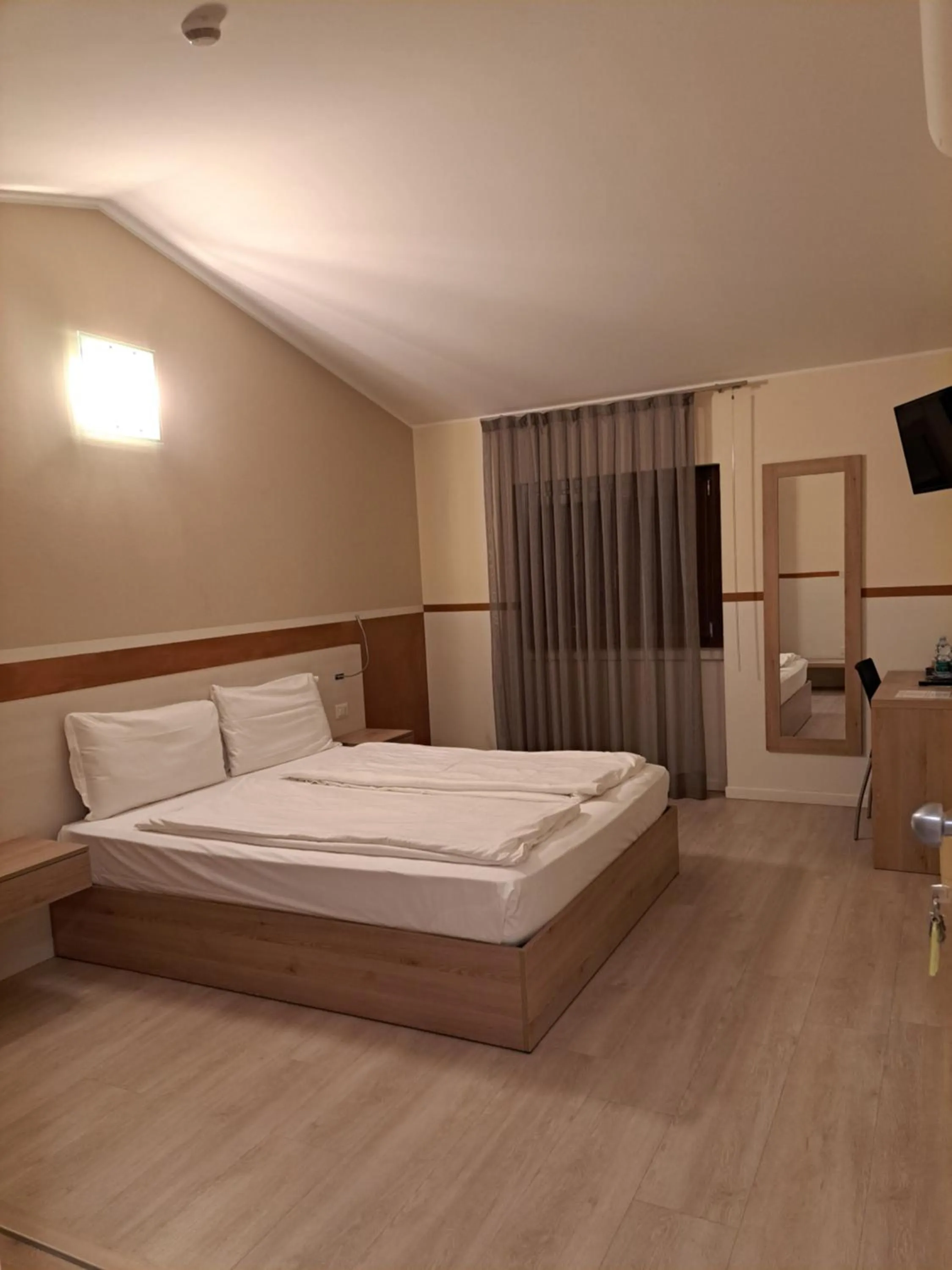 Bed in Hotel Dogana