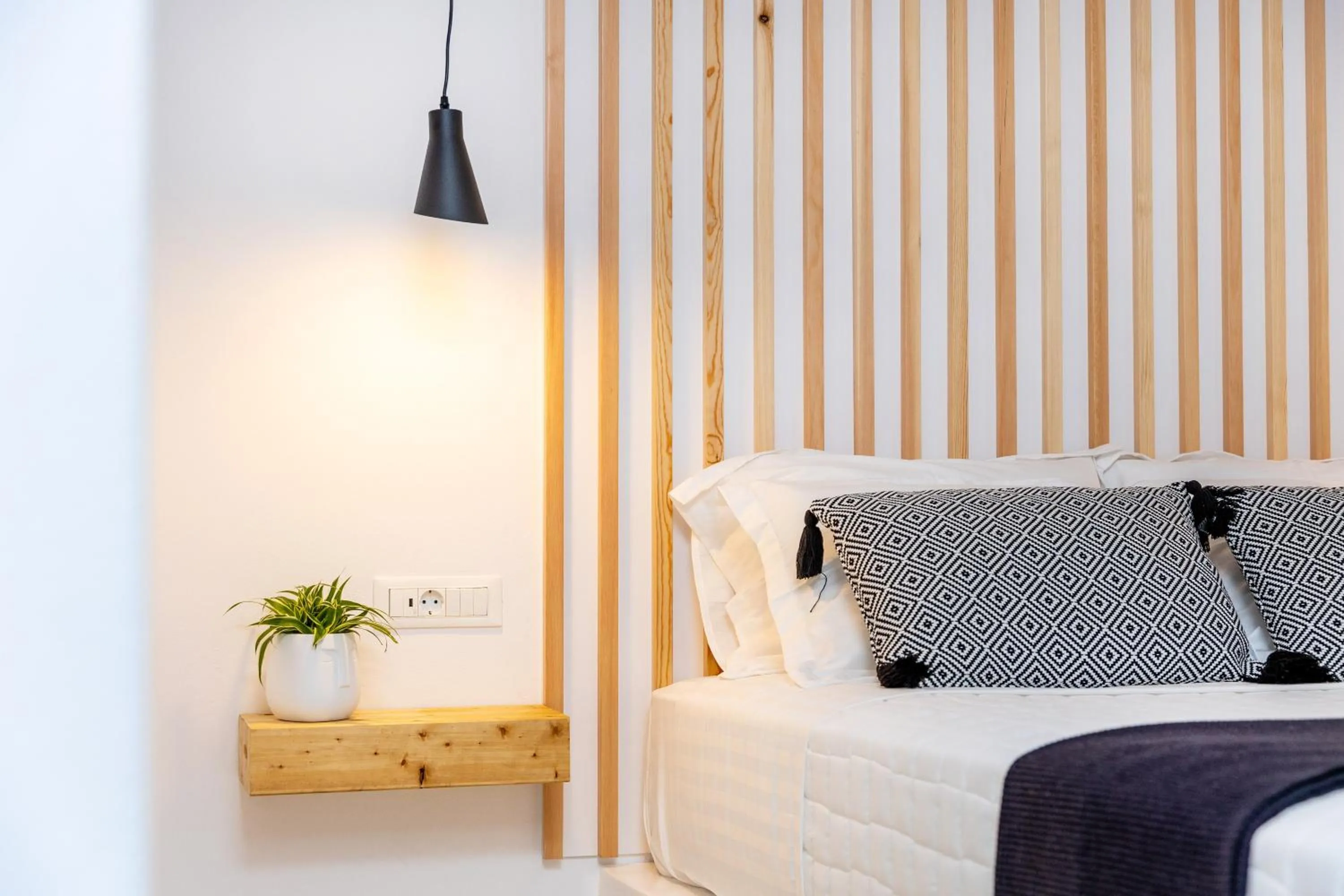 Bed in Alenor City Hotel