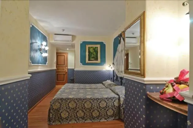 Bed in Residenza Antica Roma