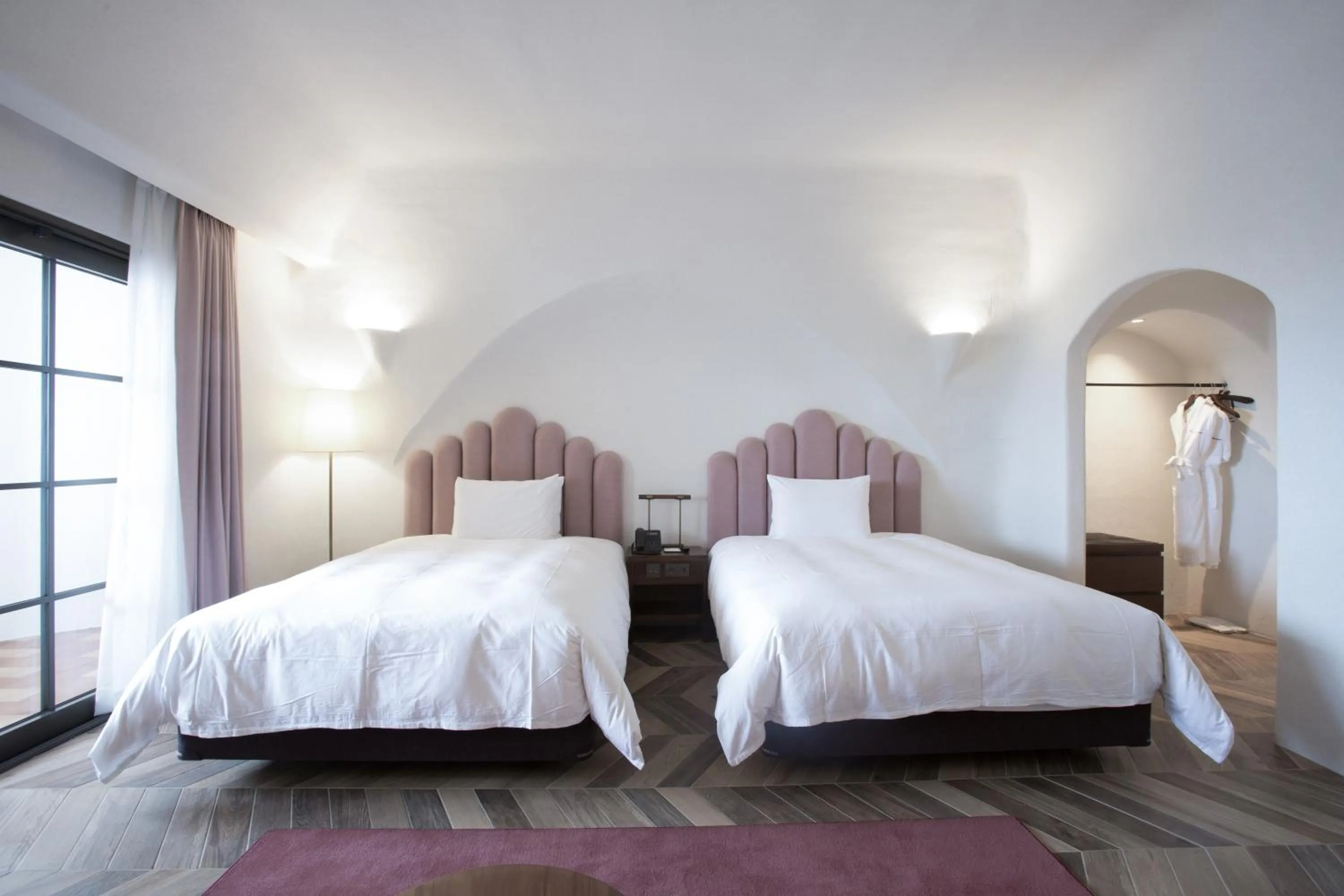 Bed in Ecoland Hotel