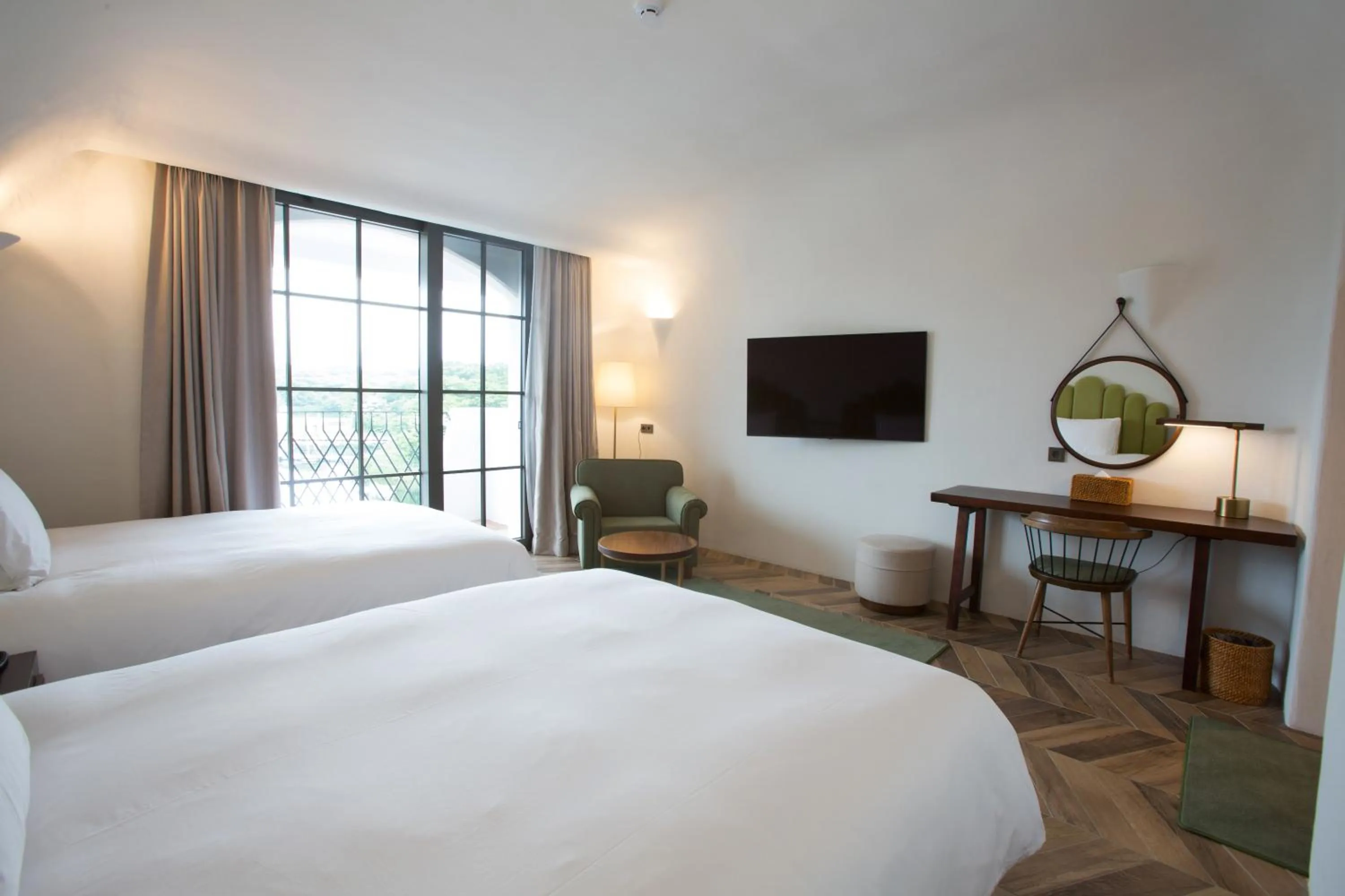 Bed in Ecoland Hotel