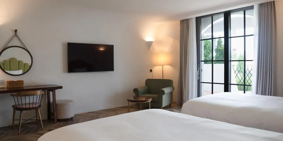 Bed in Ecoland Hotel