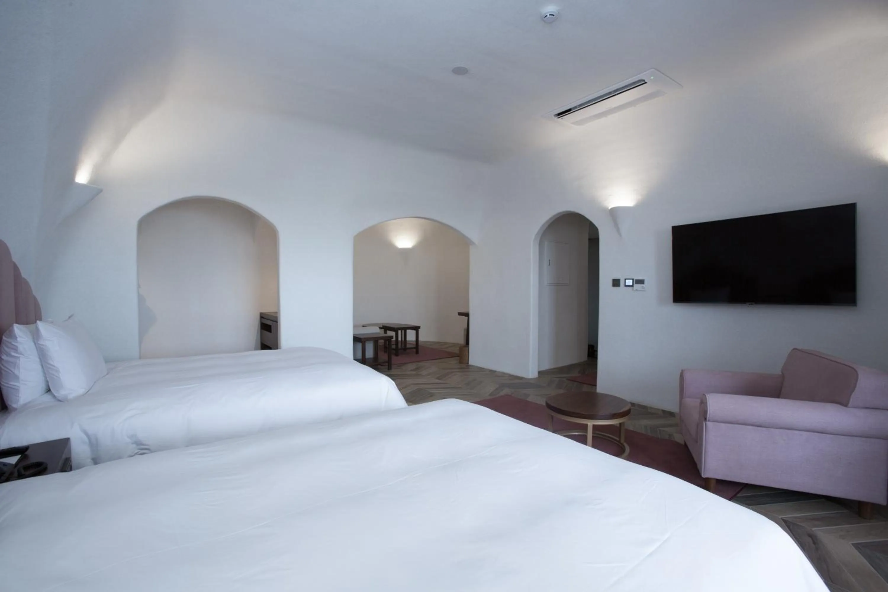 Bed in Ecoland Hotel