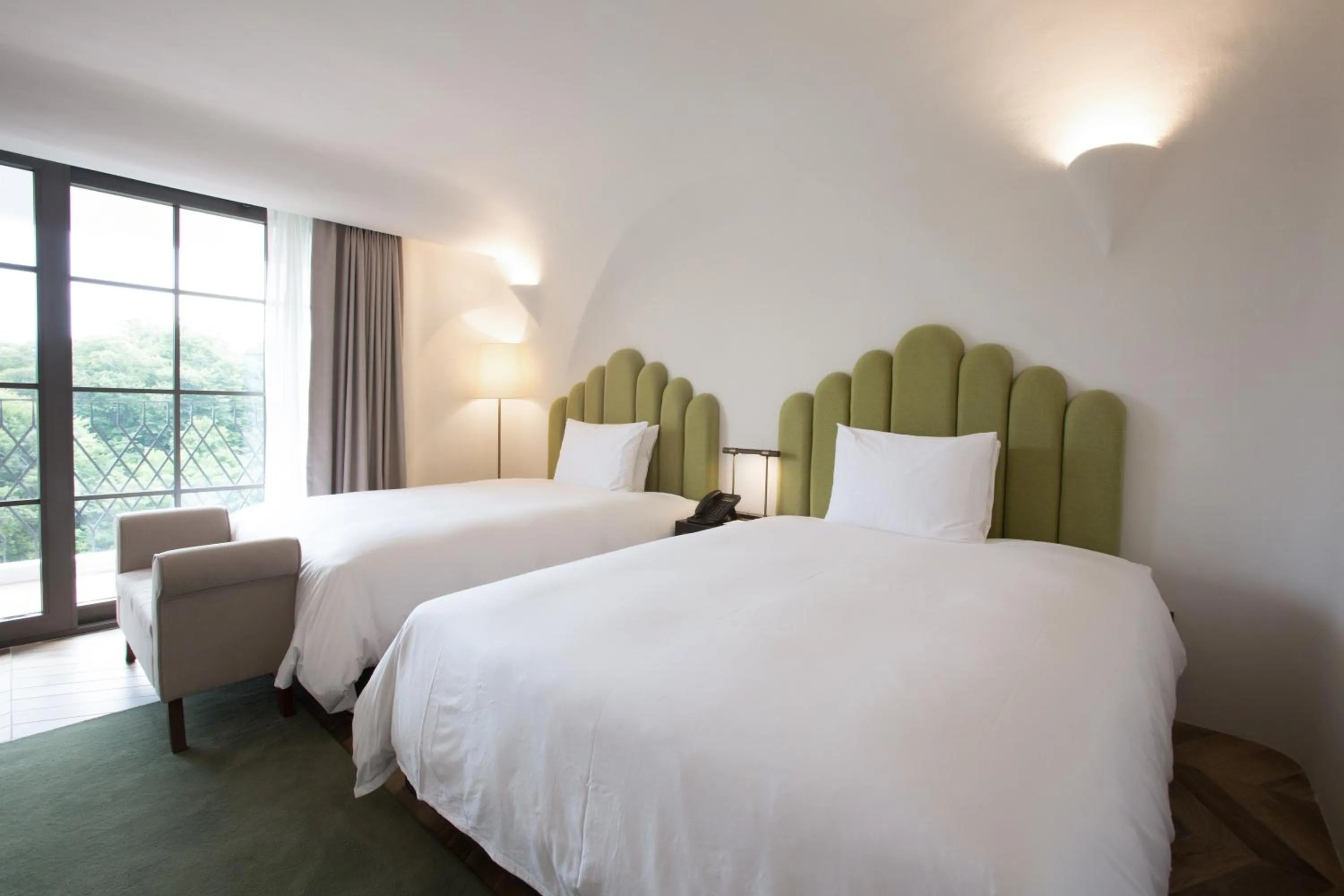 Bed in Ecoland Hotel