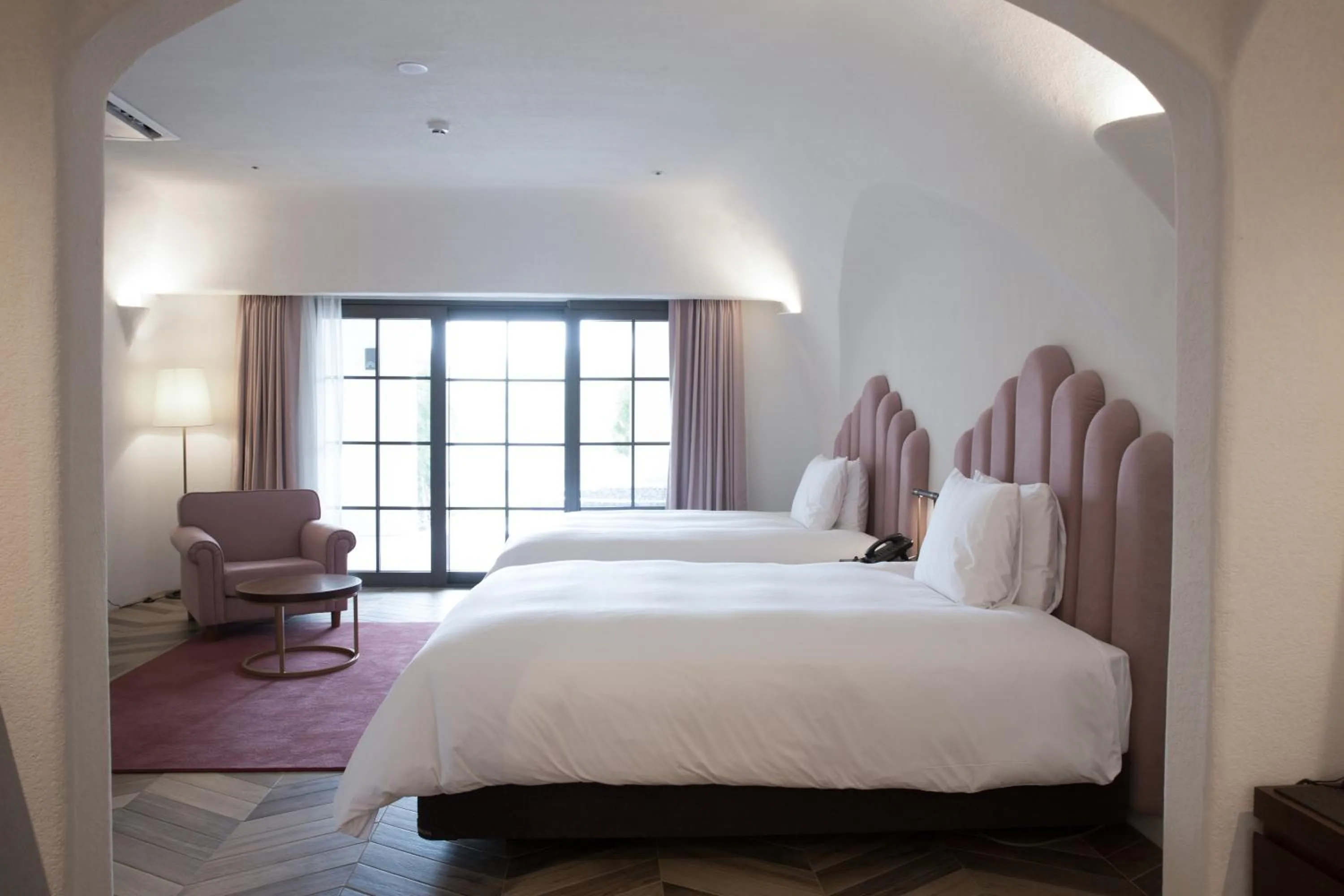 Bed in Ecoland Hotel