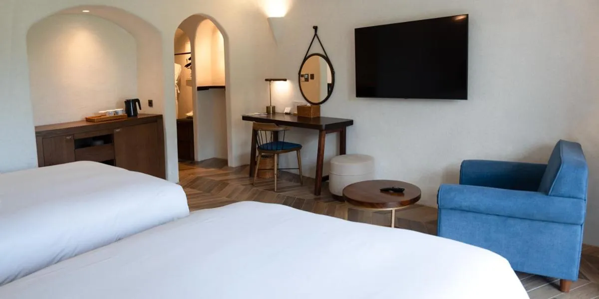 Bed in Ecoland Hotel