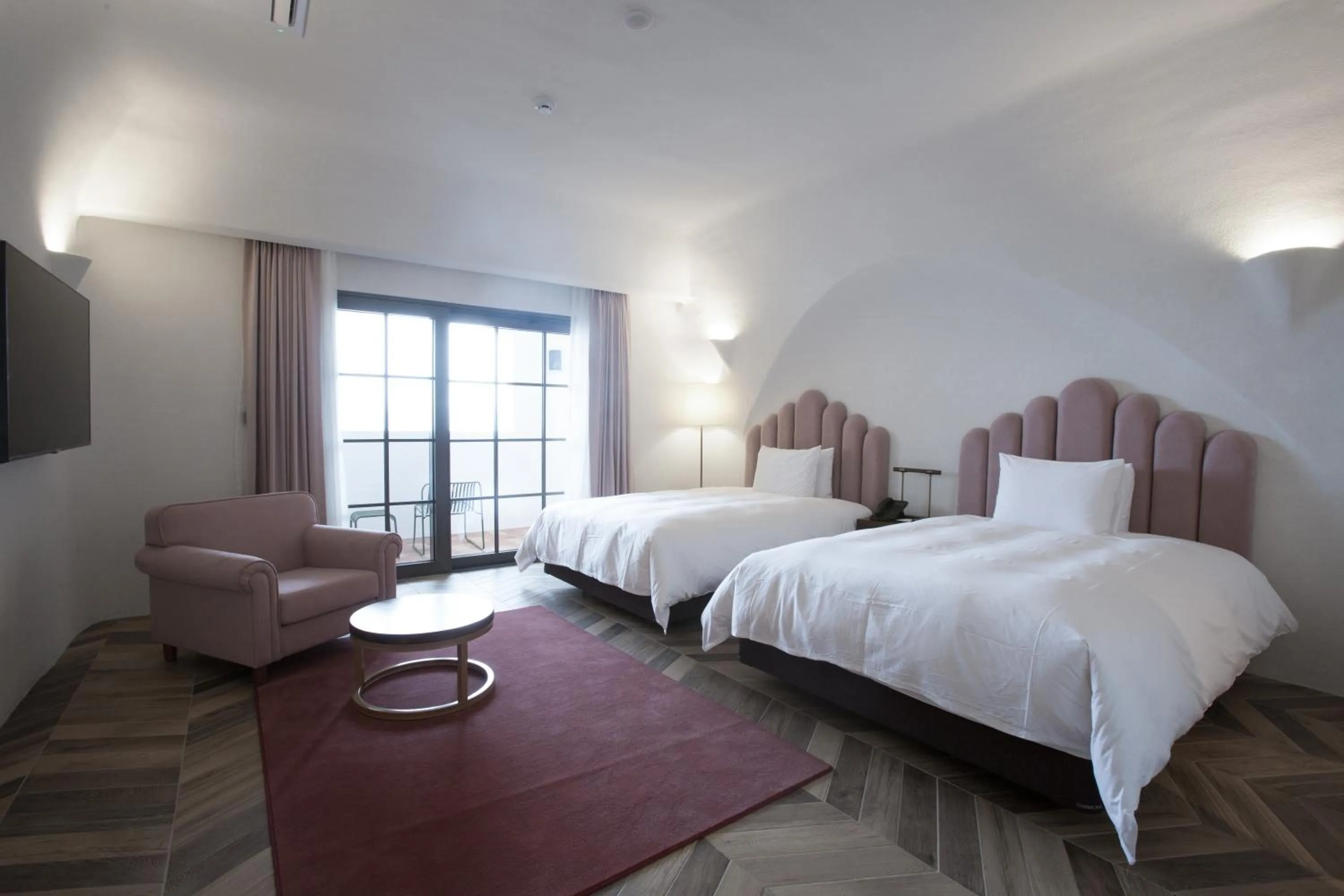 Bed in Ecoland Hotel