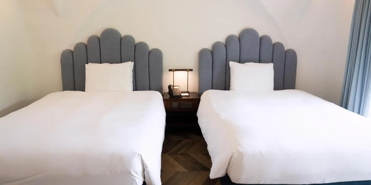 Bed in Ecoland Hotel