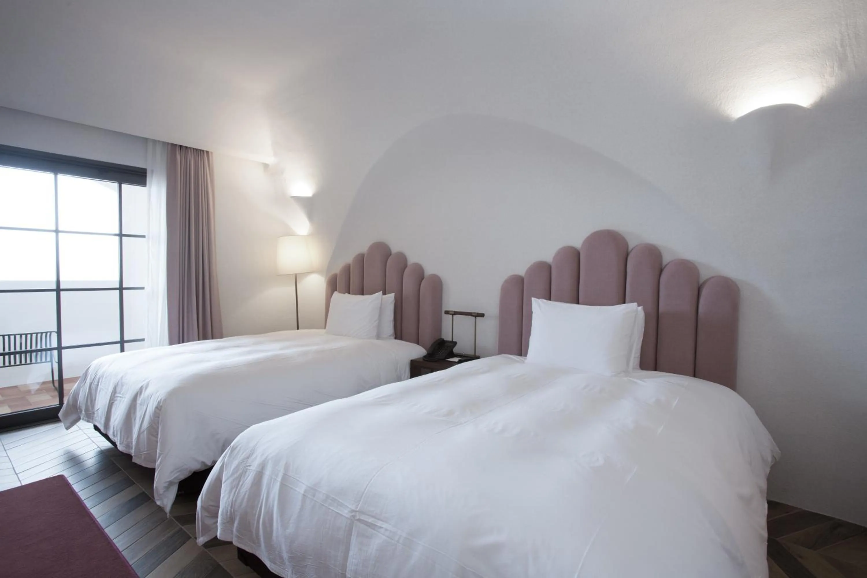 Bed in Ecoland Hotel