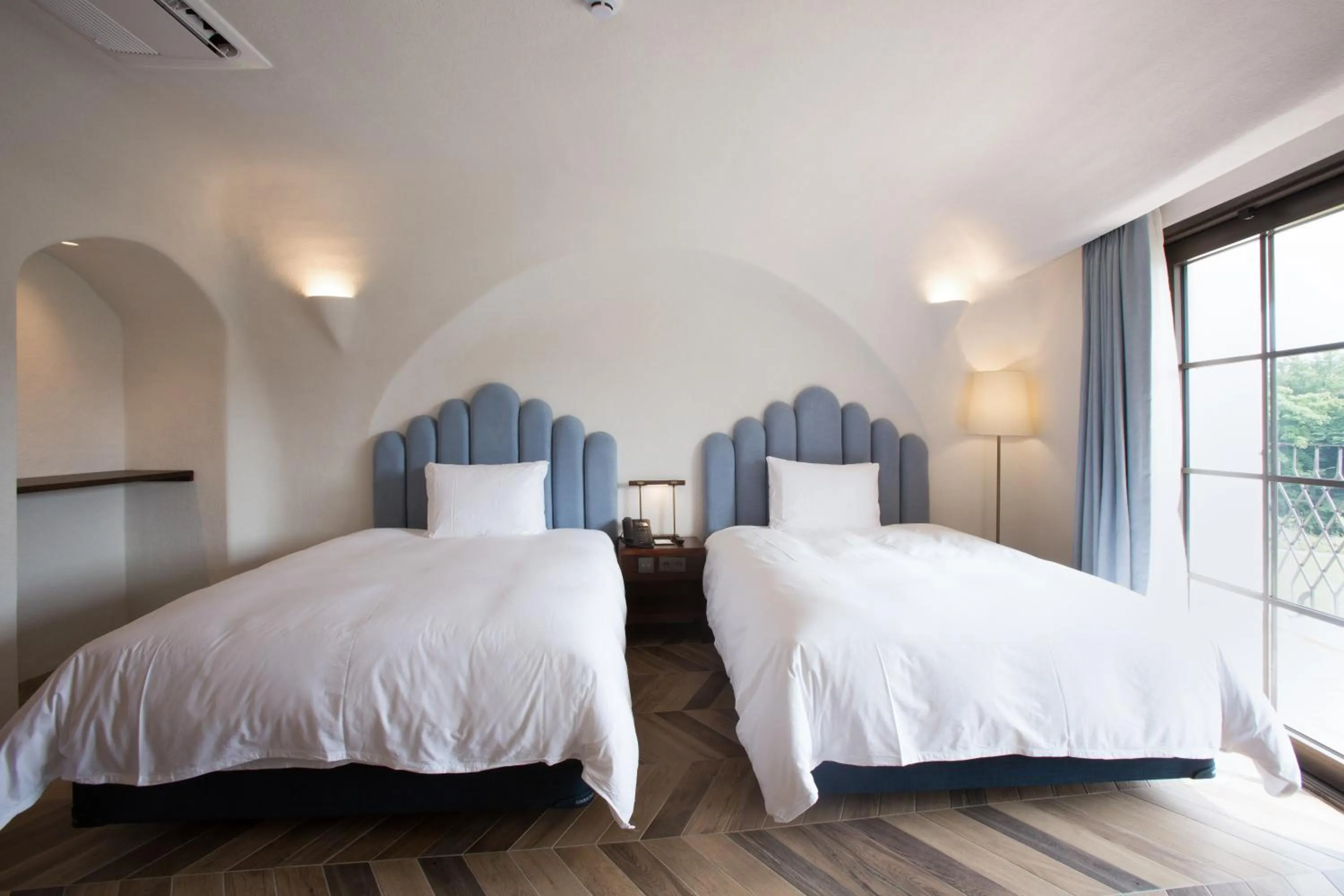 Bed in Ecoland Hotel